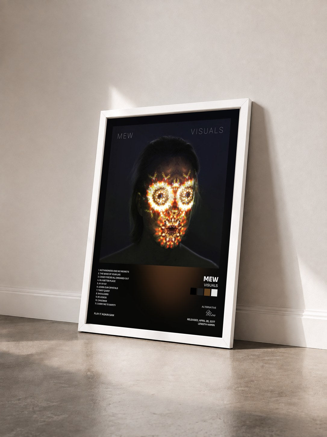 #blanc Tableau de l'album Visuals de Mew vu de trois quarts, cadre blanc