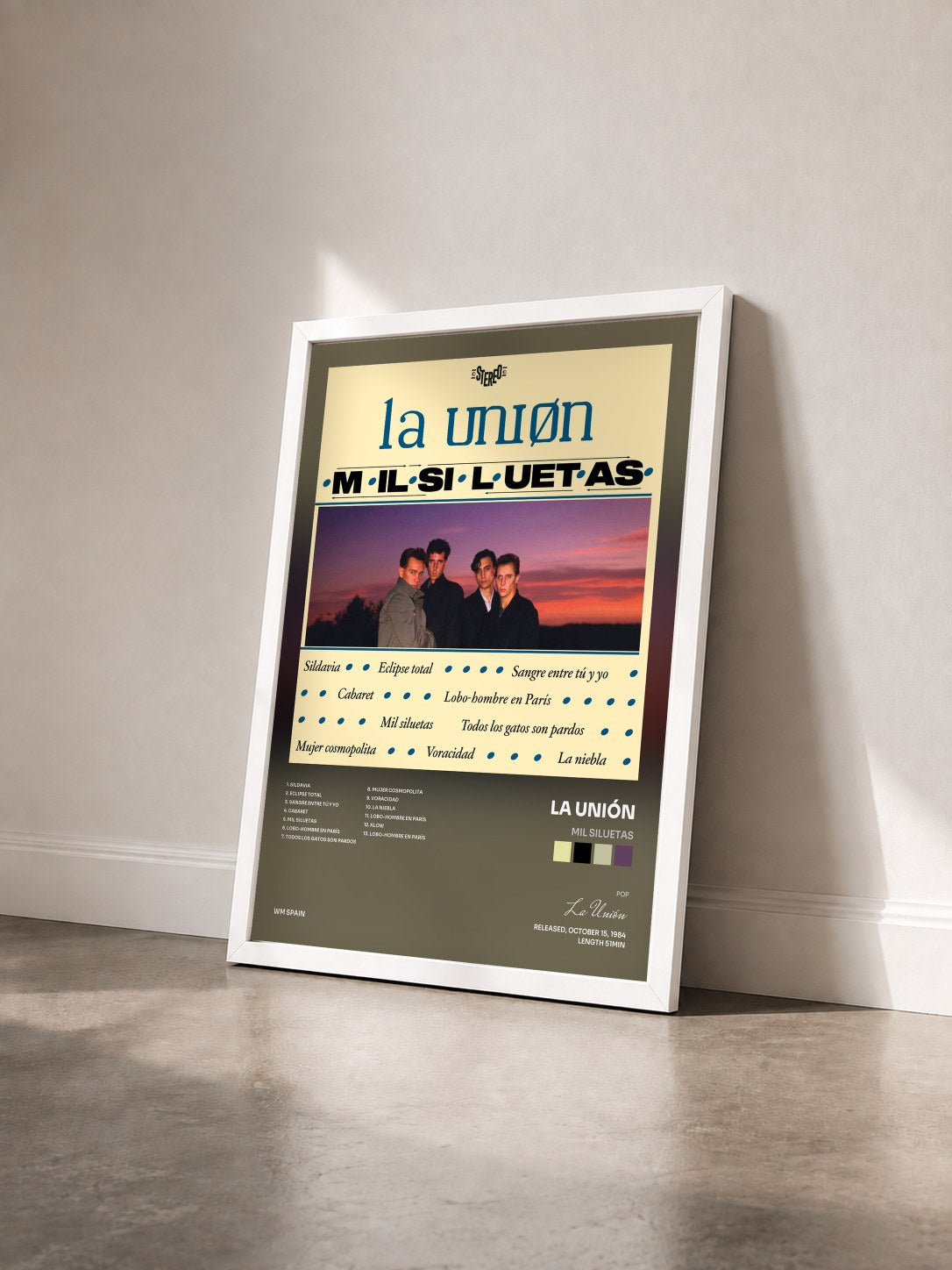 #blanc Tableau de l'album Mil Siluetas de La Unión vu de trois quarts, cadre blanc