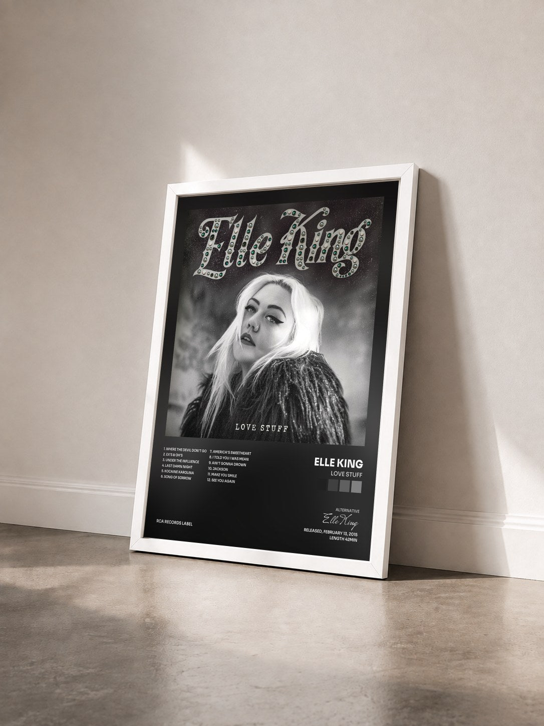#blanc Tableau de l'album Love Stuff de Elle King vu de trois quarts, cadre blanc