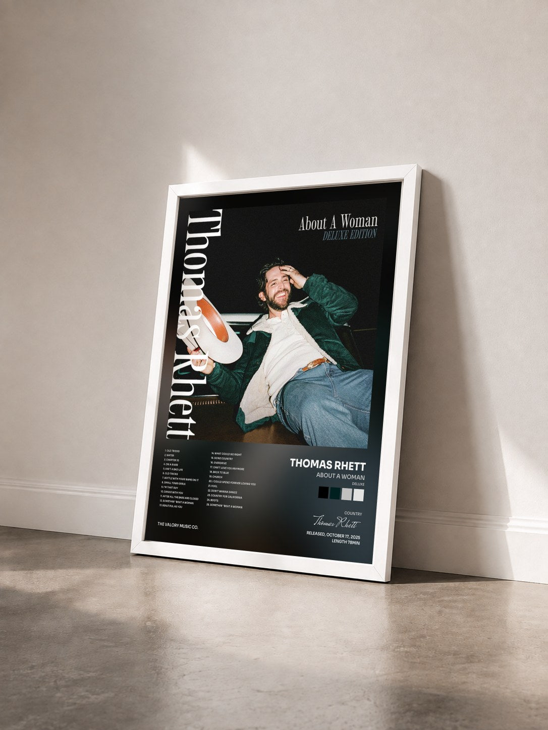 #blanc Tableau de l'album About A Woman (Deluxe) de Thomas Rhett vu de trois quarts, cadre blanc