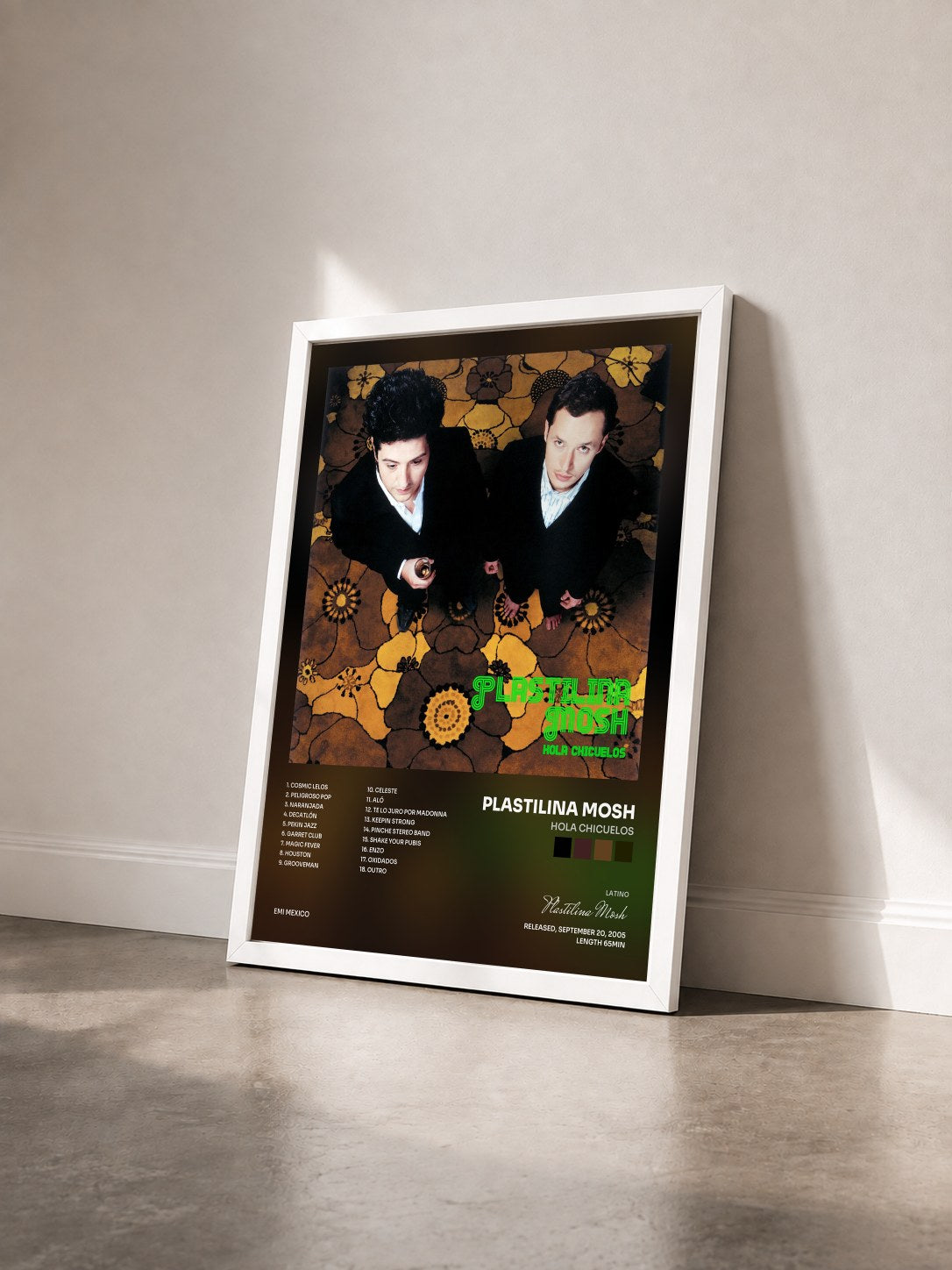 #blanc Tableau de l'album Hola Chicuelos de Plastilina Mosh vu de trois quarts, cadre blanc