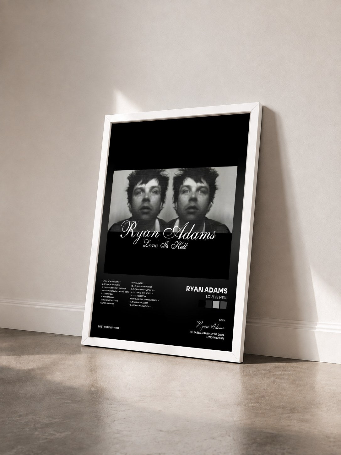 #blanc Tableau de l'album Love Is Hell de Ryan Adams vu de trois quarts, cadre blanc