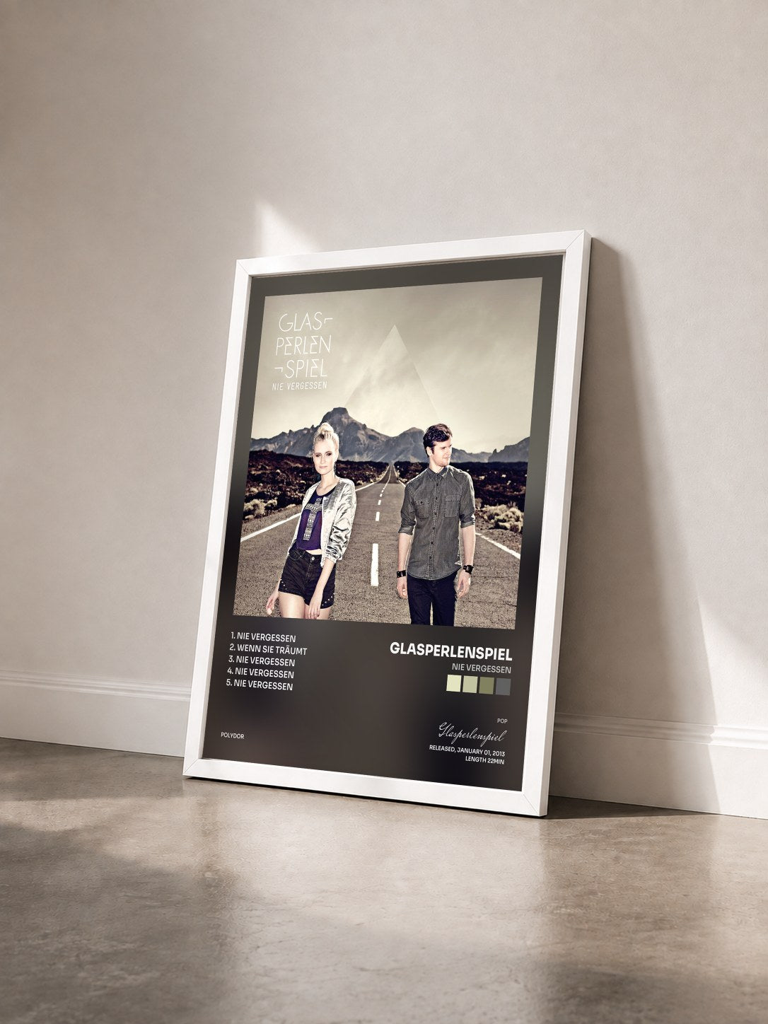 #blanc Tableau de l'album Nie vergessen de Glasperlenspiel vu de trois quarts, cadre blanc