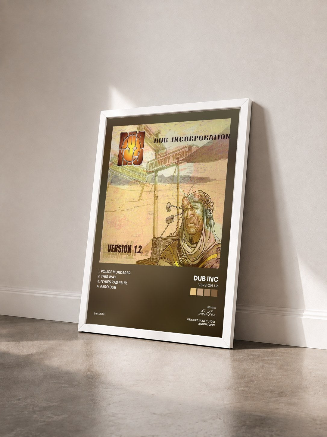 #blanc Tableau de l'album Version 1.2 de Dub Inc vu de trois quarts, cadre blanc