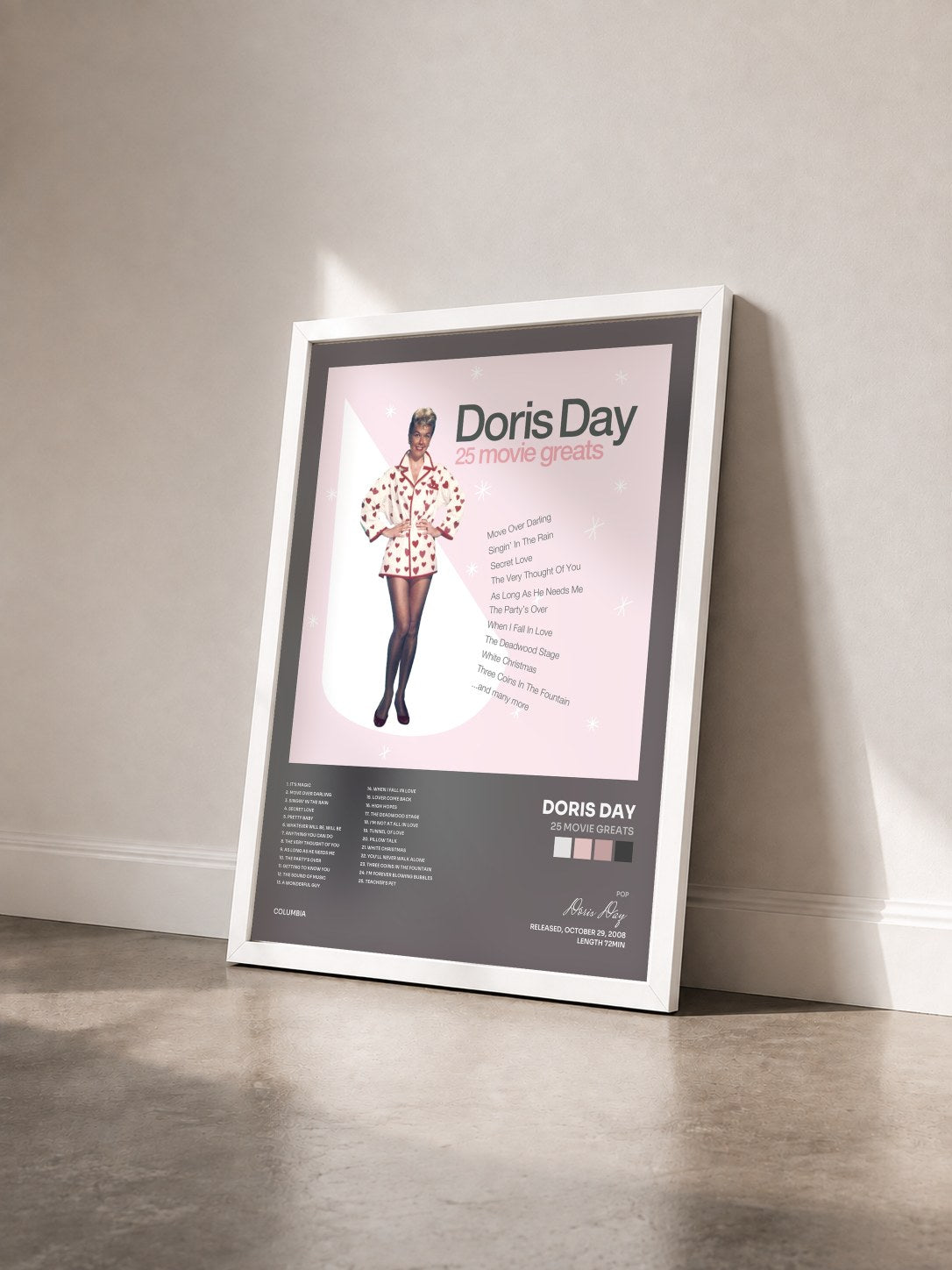 #blanc Tableau de l'album 25 Movie Greats de Doris Day vu de trois quarts, cadre blanc