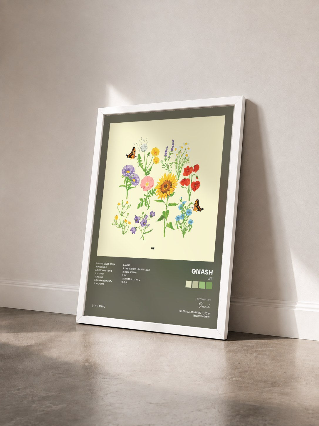 #blanc Tableau de l'album we de Gnash vu de trois quarts, cadre blanc