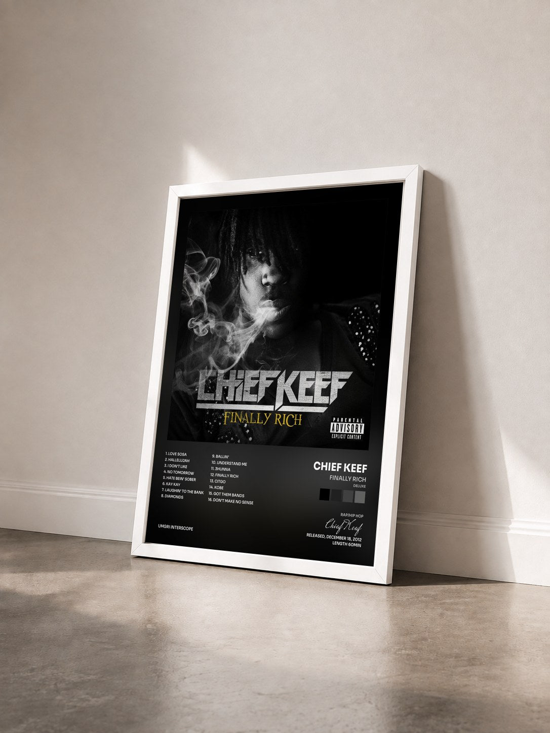 #blanc Tableau de l'album Finally Rich (Deluxe) de Chief Keef vu de trois quarts, cadre blanc