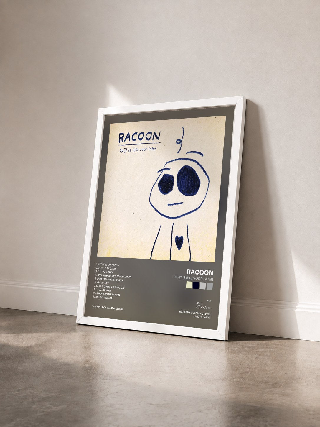 #blanc Tableau de l'album Spijt Is Iets Voor Later de Racoon vu de trois quarts, cadre blanc