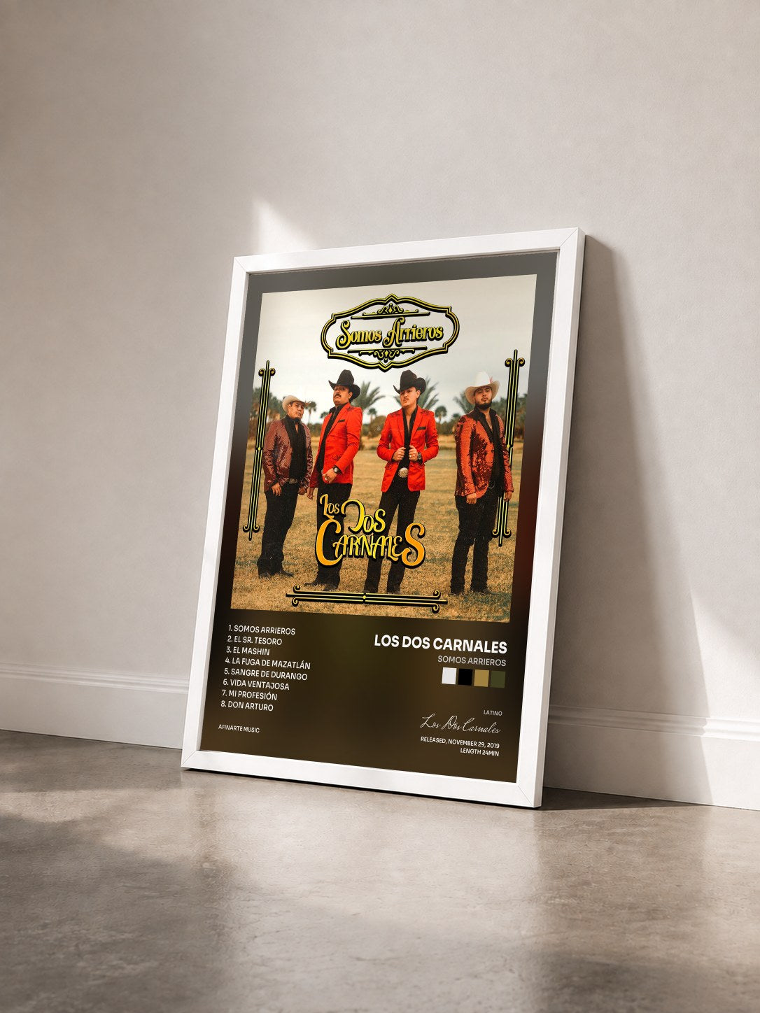 #blanc Tableau de l'album Somos Arrieros de Los Dos Carnales vu de trois quarts, cadre blanc