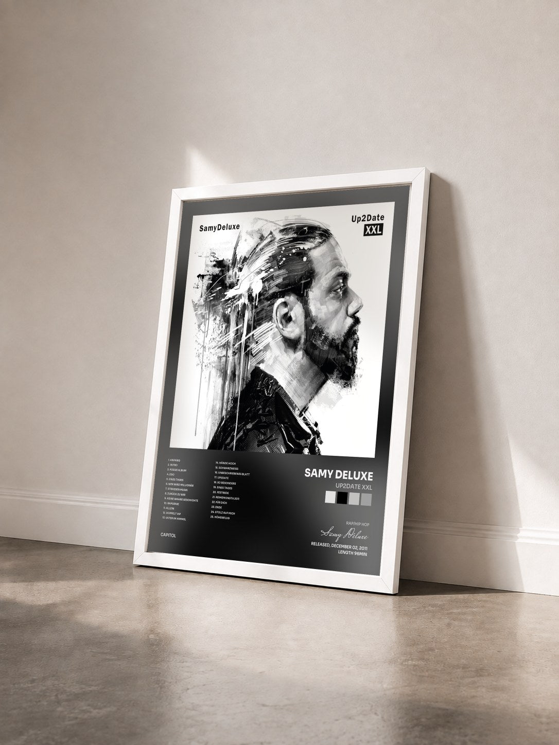 #blanc Tableau de l'album Up2Date XXL de Samy Deluxe vu de trois quarts, cadre blanc