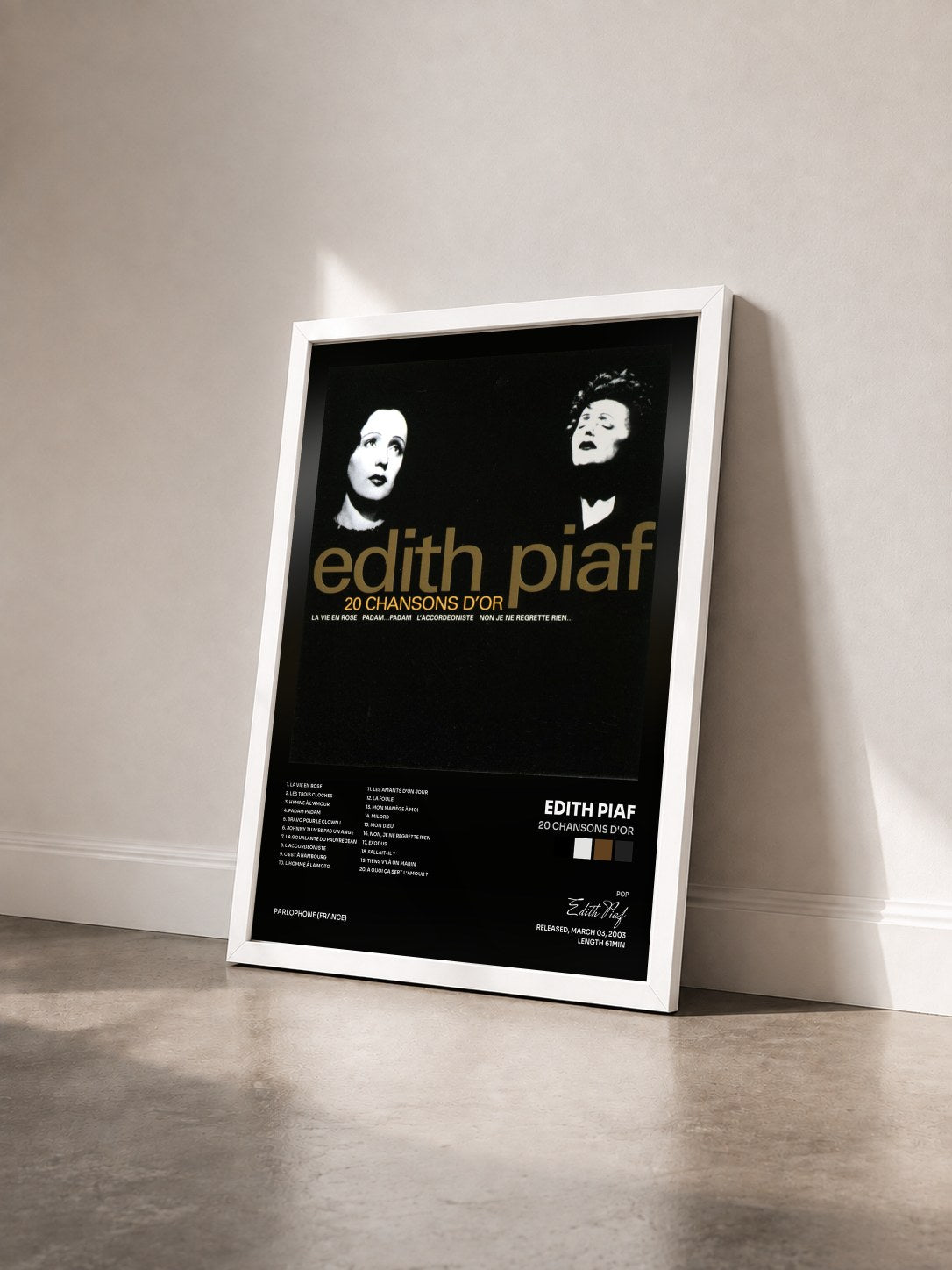 #blanc Tableau de l'album 20 chansons d'or de Edith Piaf vu de trois quarts, cadre blanc