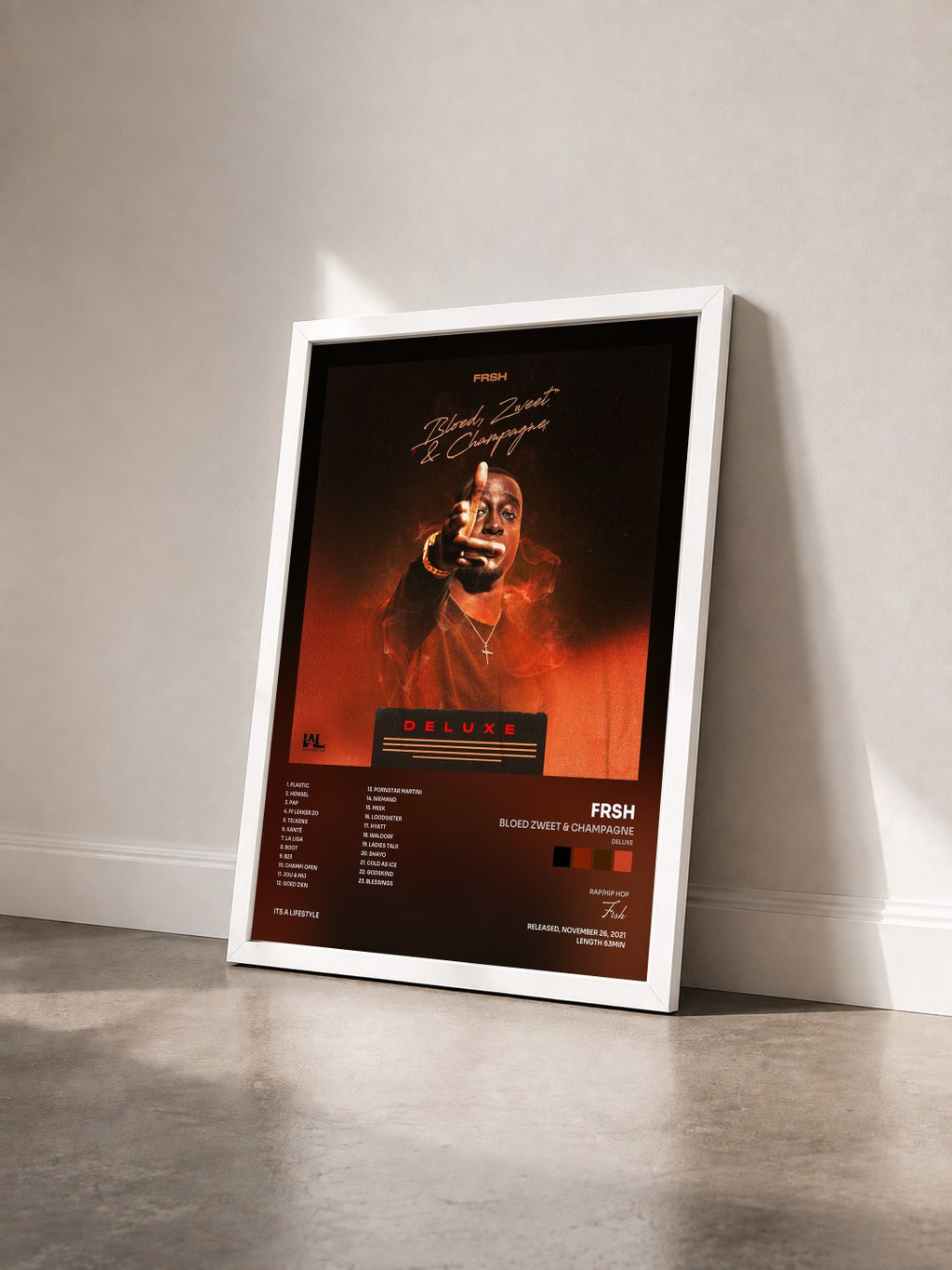 #blanc Tableau de l'album Bloed Zweet & Champagne (Deluxe) de Frsh vu de trois quarts, cadre blanc