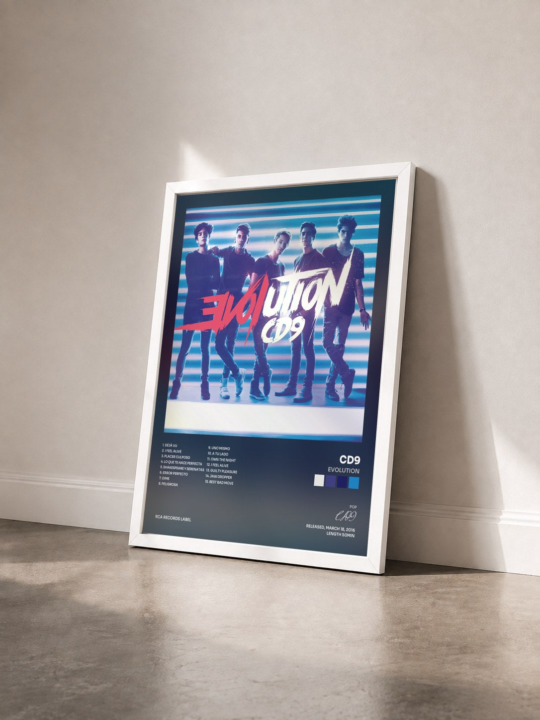 #blanc Tableau de l'album EVOLUTION de CD9 vu de trois quarts, cadre blanc