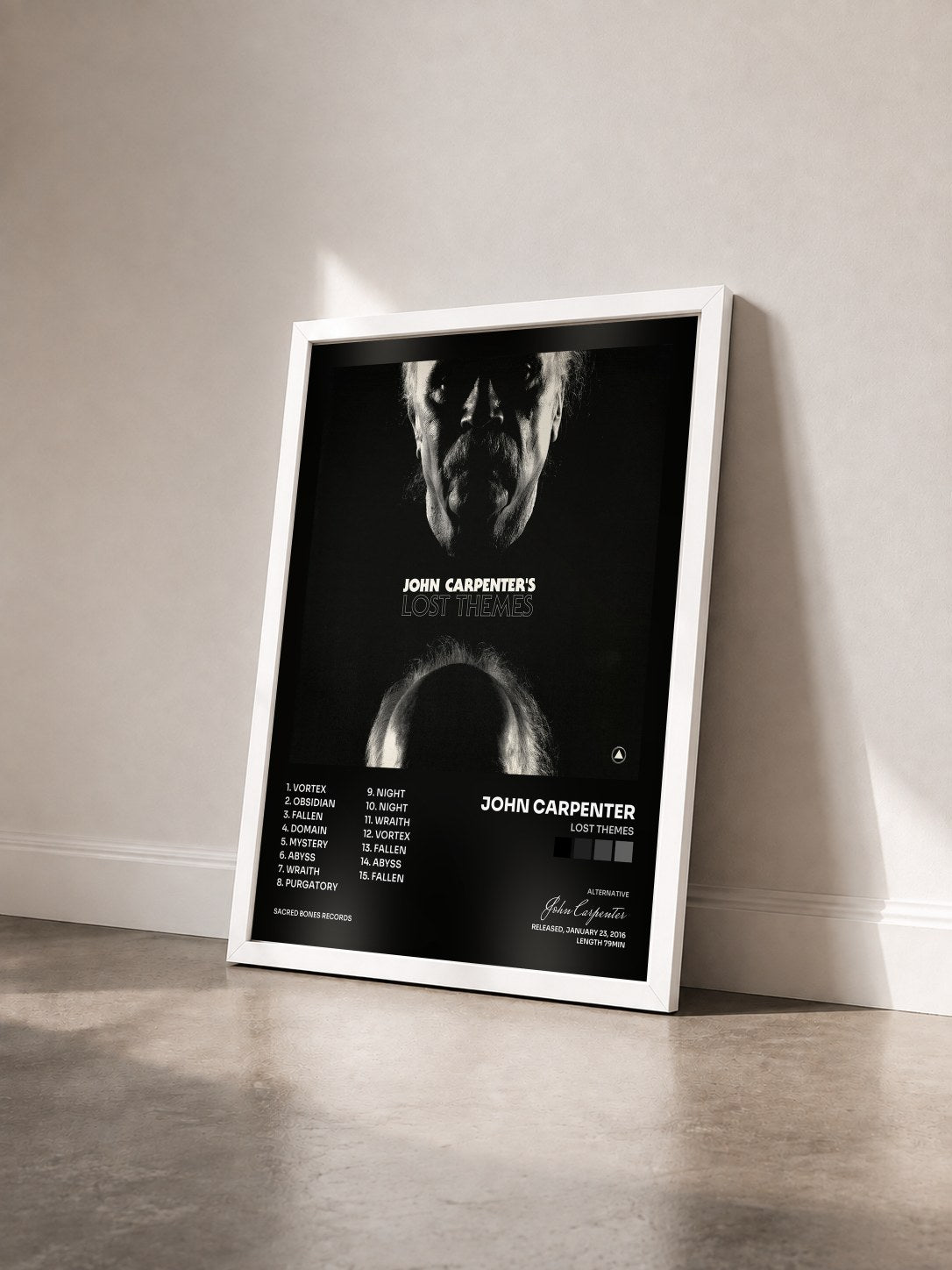 #blanc Tableau de l'album Lost Themes de John Carpenter vu de trois quarts, cadre blanc