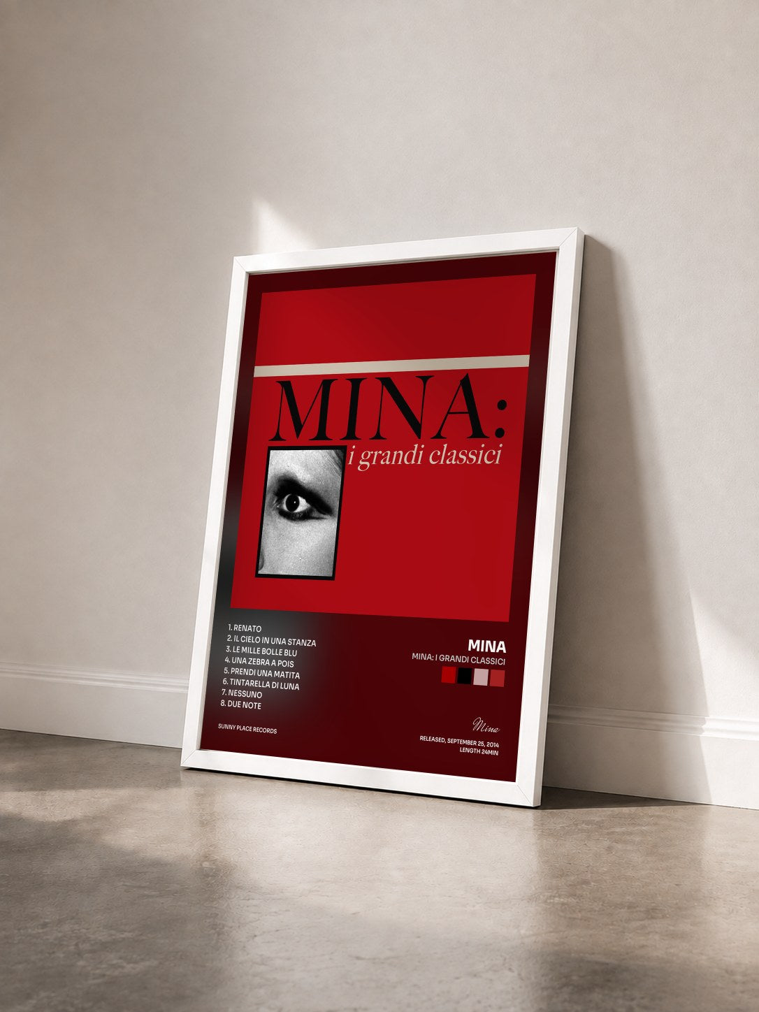 #blanc Tableau de l'album Mina: i grandi classici de Mina vu de trois quarts, cadre blanc
