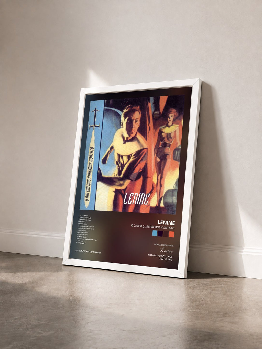 #blanc Tableau de l'album O Dia em que Faremos Contato de Lenine vu de trois quarts, cadre blanc