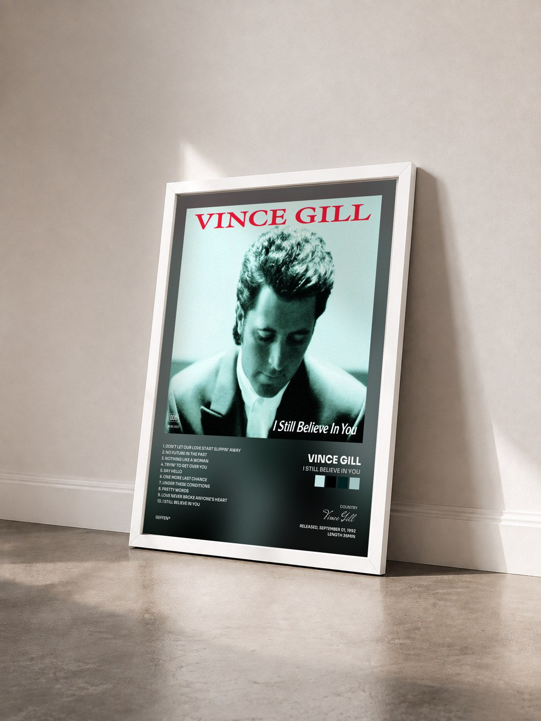 #blanc Tableau de l'album I Still Believe In You de Vince Gill vu de trois quarts, cadre blanc
