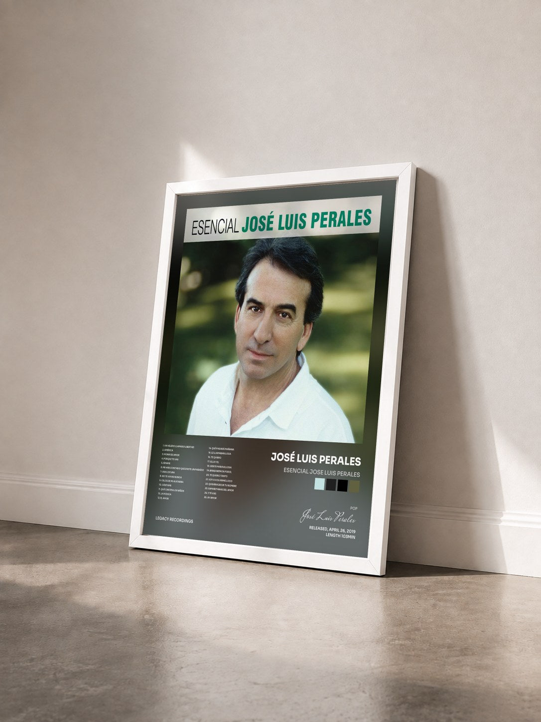 #blanc Tableau de l'album Esencial Jose Luis Perales de José Luis Perales vu de trois quarts, cadre blanc