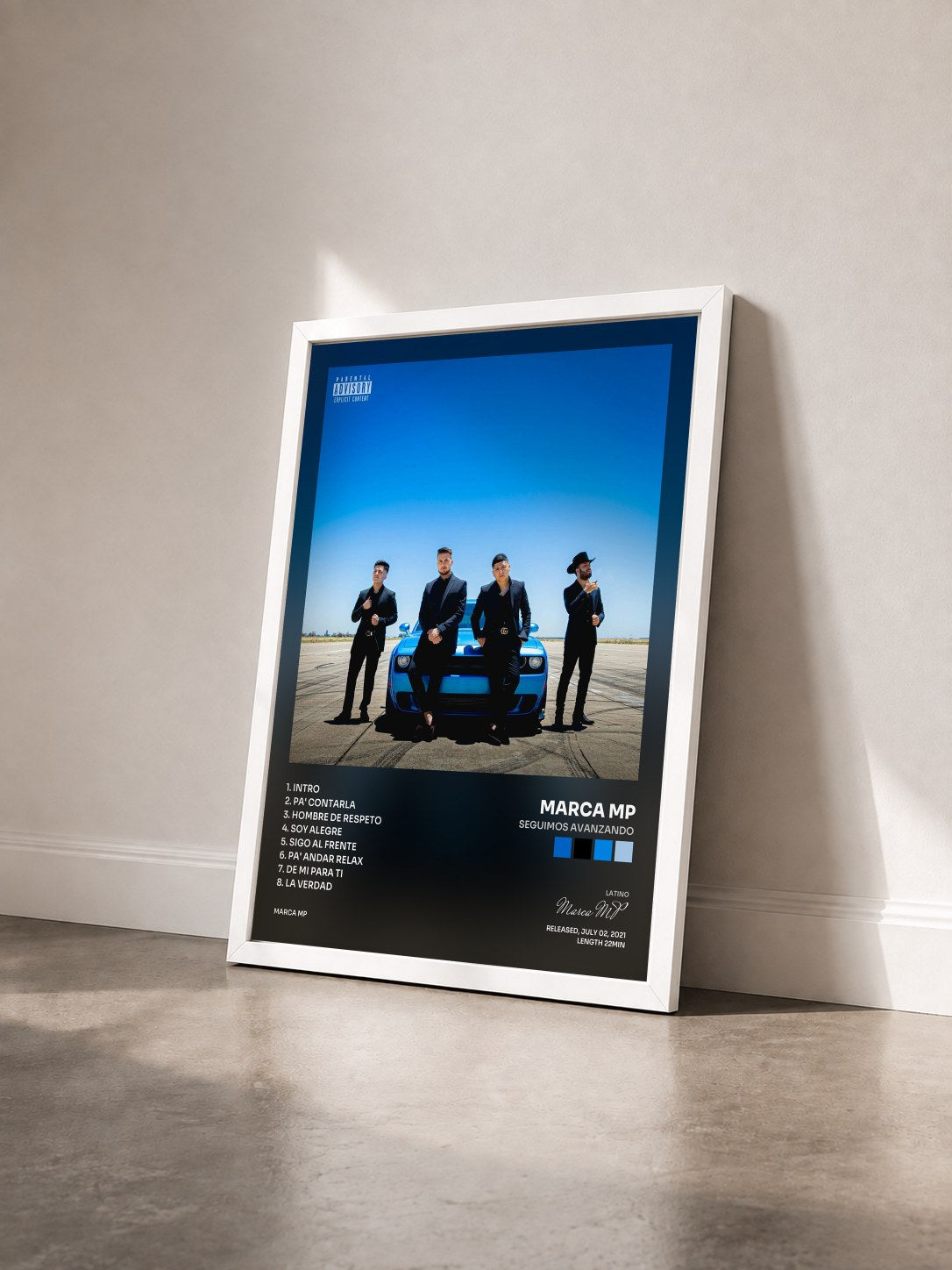#blanc Tableau de l'album Seguimos Avanzando de Marca MP vu de trois quarts, cadre blanc