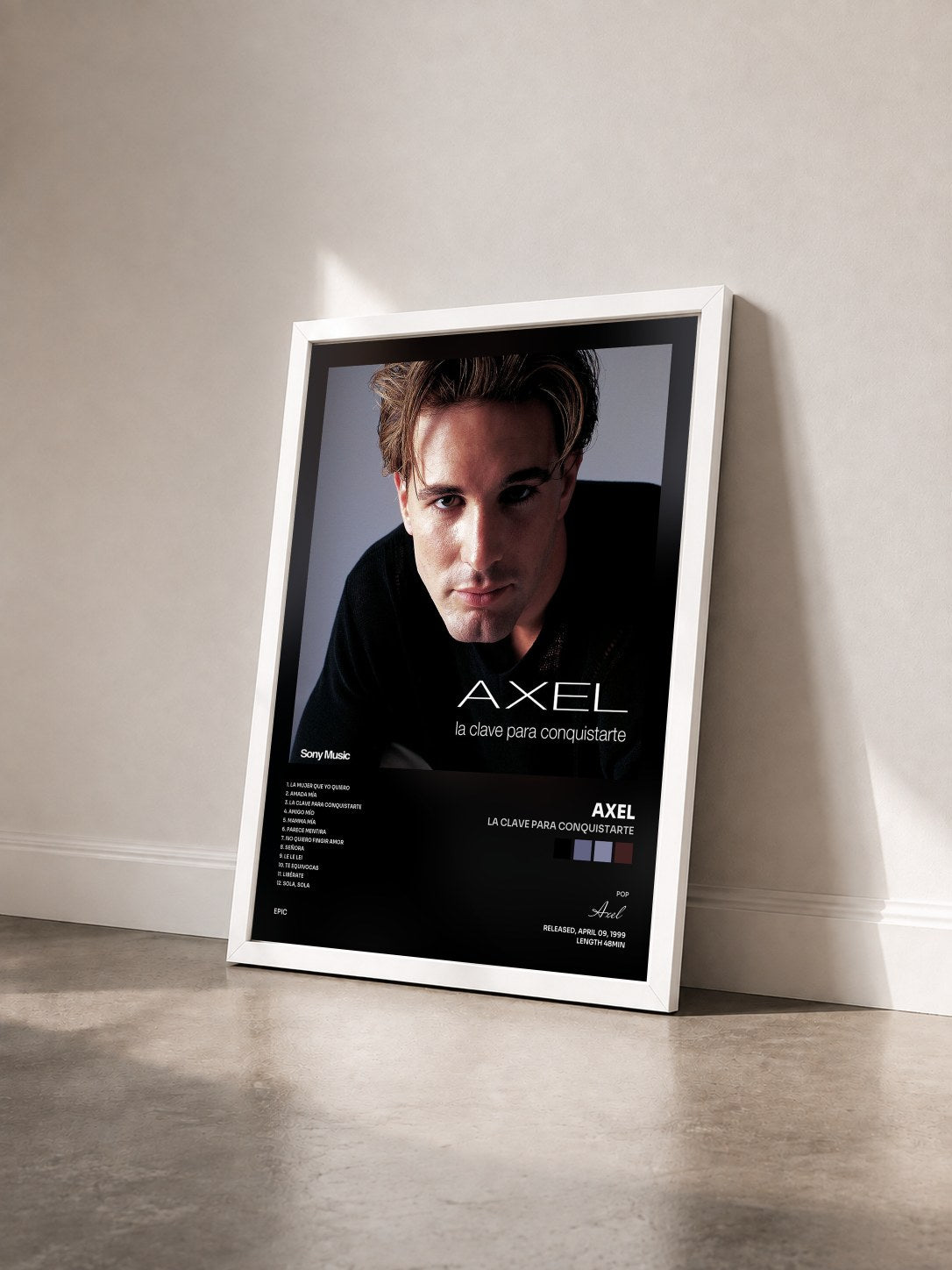 #blanc Tableau de l'album La Clave para Conquistarte de Axel vu de trois quarts, cadre blanc