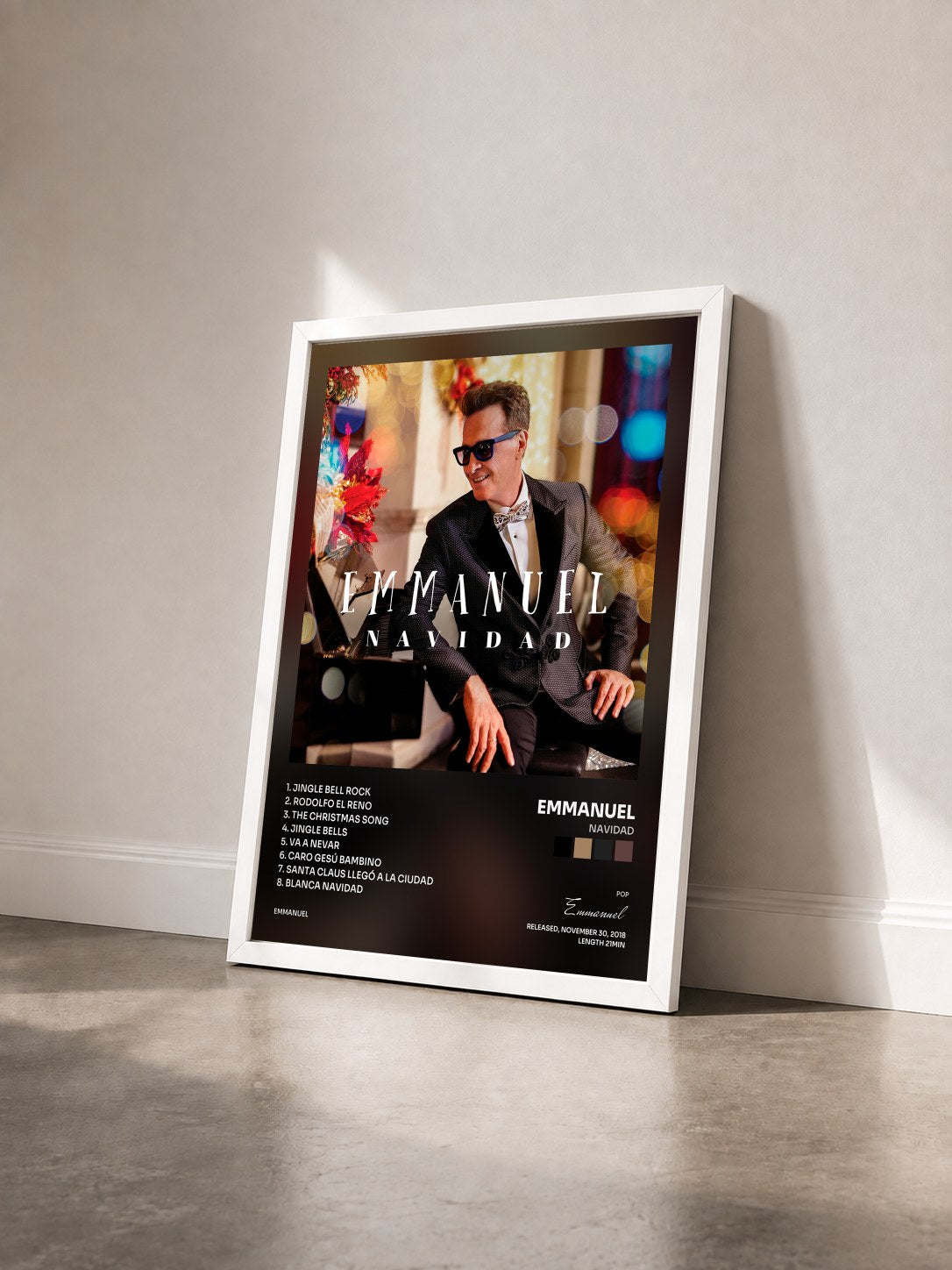 #blanc Tableau de l'album Navidad de Emmanuel vu de trois quarts, cadre blanc