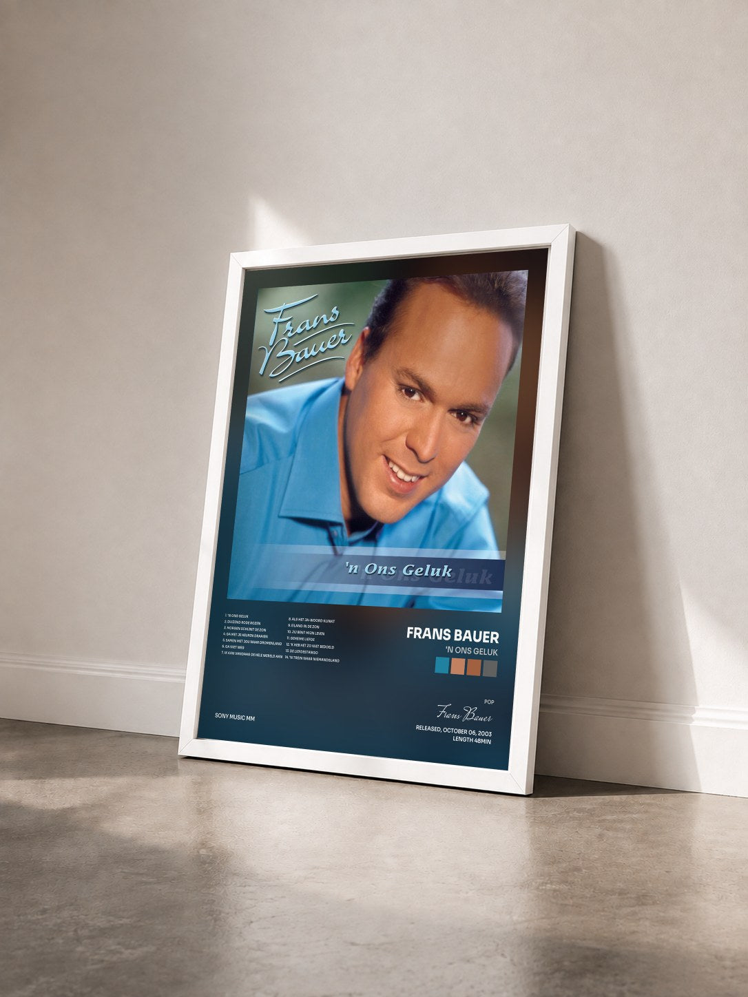 #blanc Tableau de l'album 'N Ons Geluk de Frans Bauer vu de trois quarts, cadre blanc