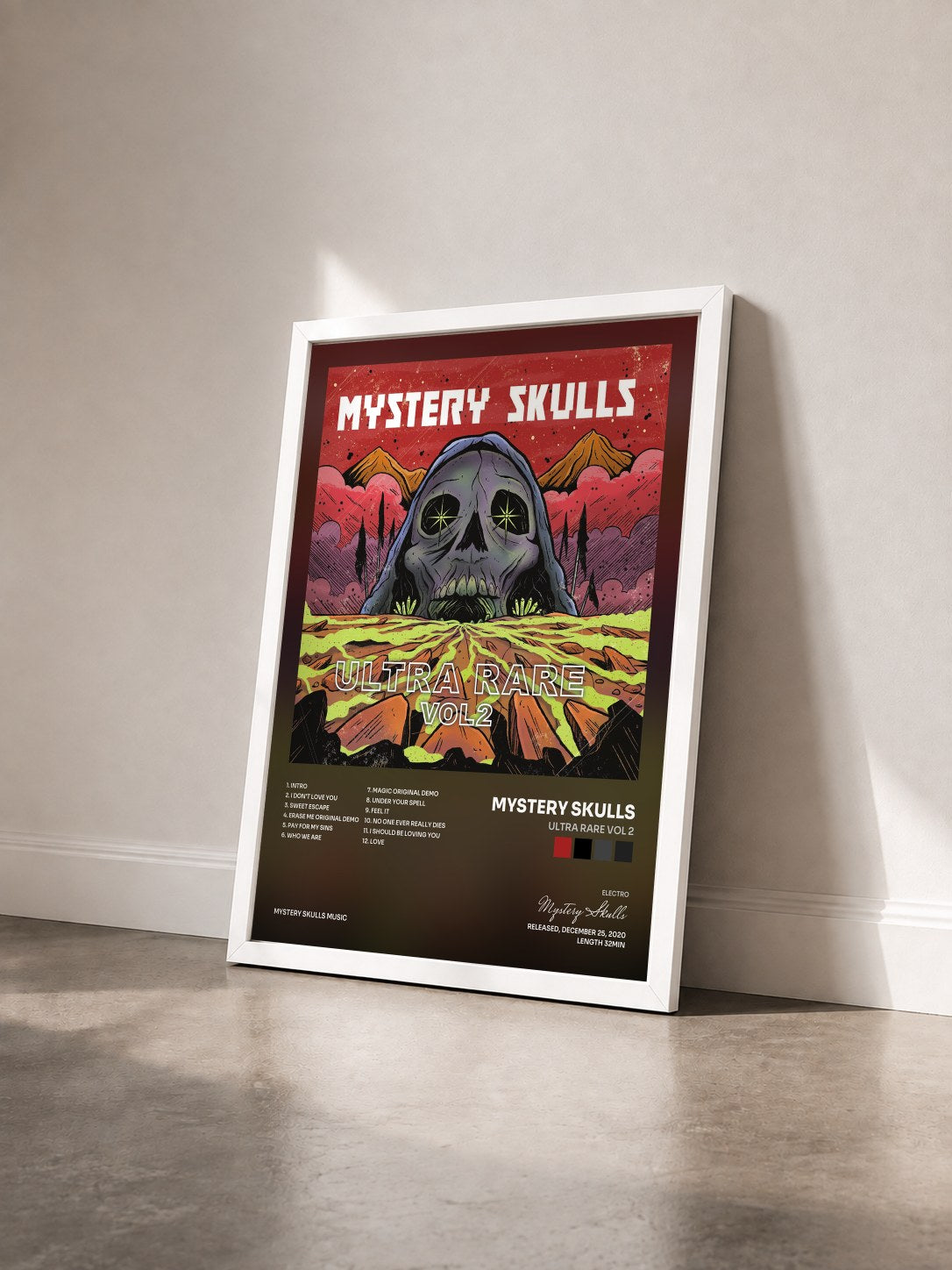 #blanc Tableau de l'album Ultra Rare Vol 2 de Mystery Skulls vu de trois quarts, cadre blanc