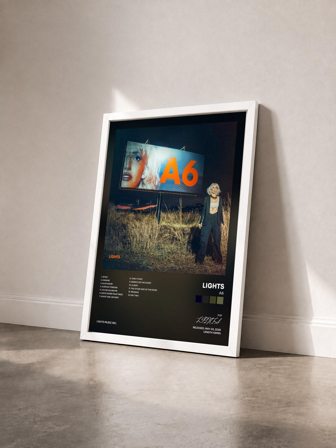 #blanc Tableau de l'album A6 de LIGHTS vu de trois quarts, cadre blanc