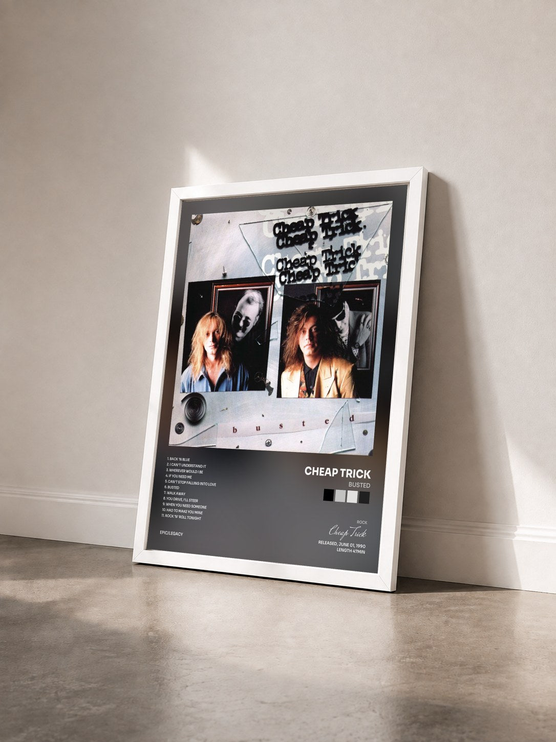 #blanc Tableau de l'album Busted de Cheap Trick vu de trois quarts, cadre blanc