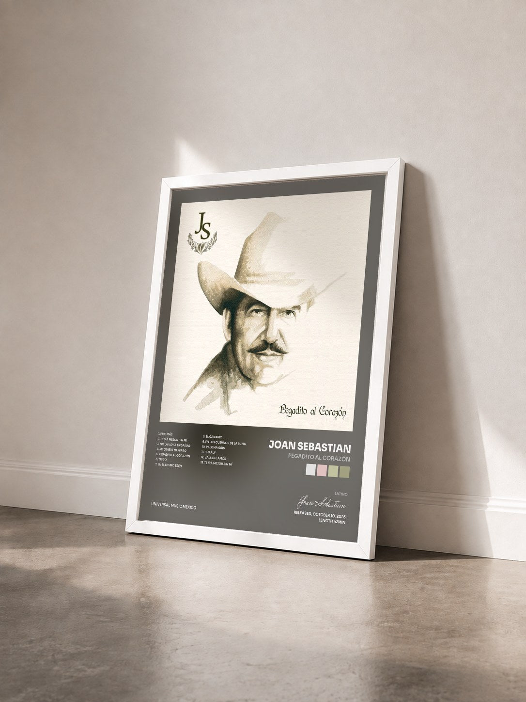 #blanc Tableau de l'album Pegadito Al Corazón de Joan Sebastian vu de trois quarts, cadre blanc