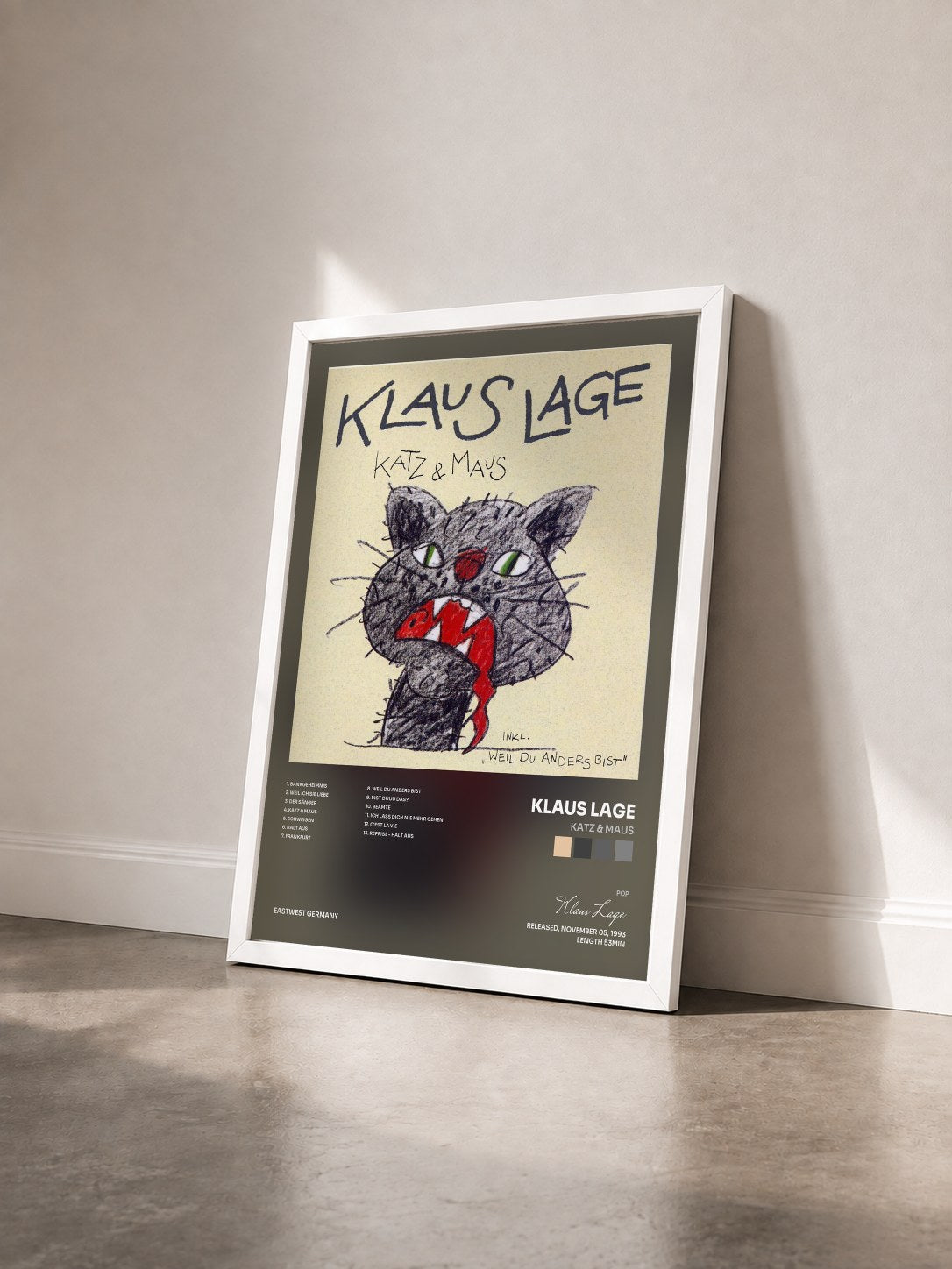 #blanc Tableau de l'album Katz & Maus de Klaus Lage vu de trois quarts, cadre blanc