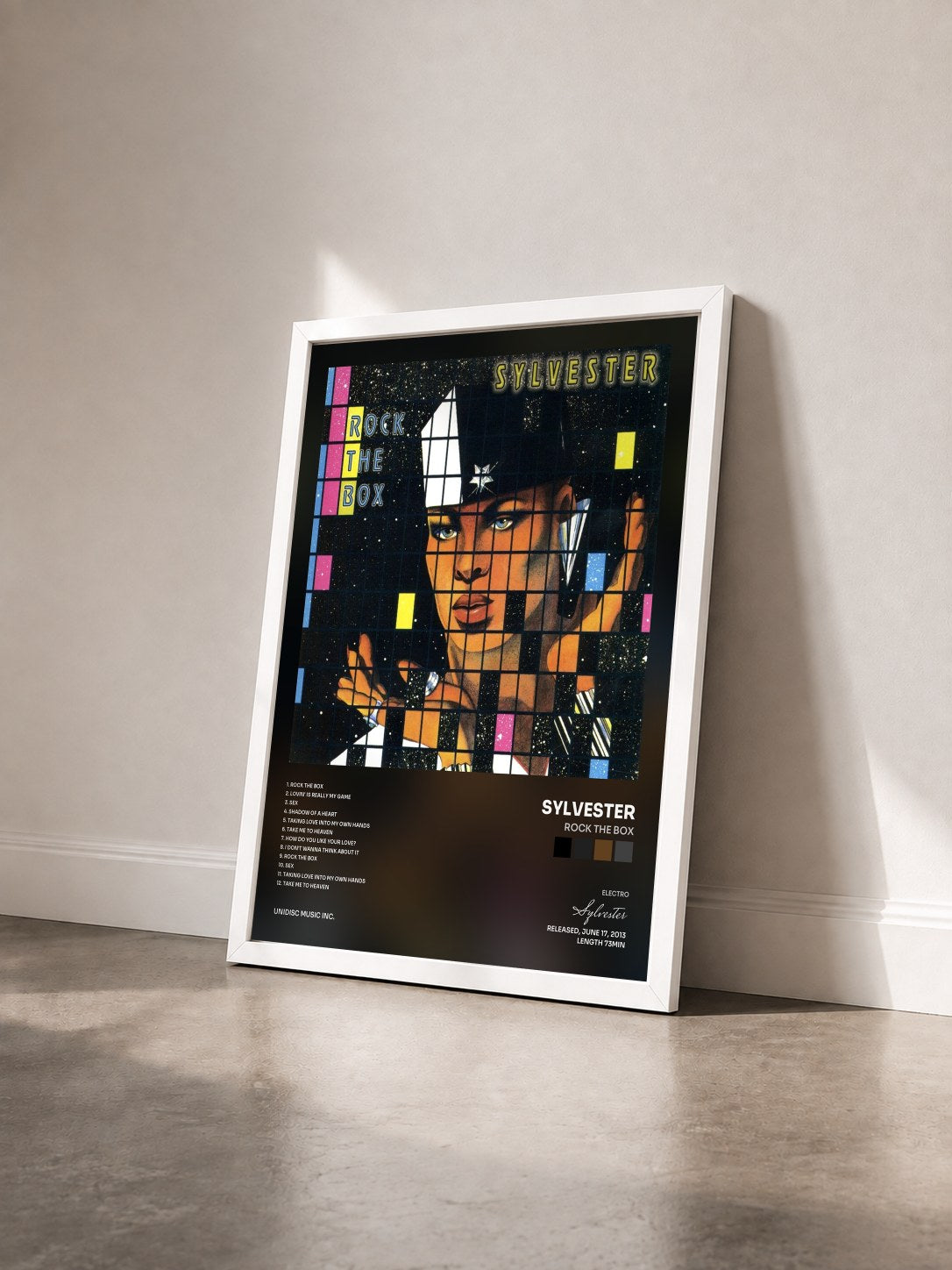 #blanc Tableau de l'album Rock the Box de Sylvester vu de trois quarts, cadre blanc