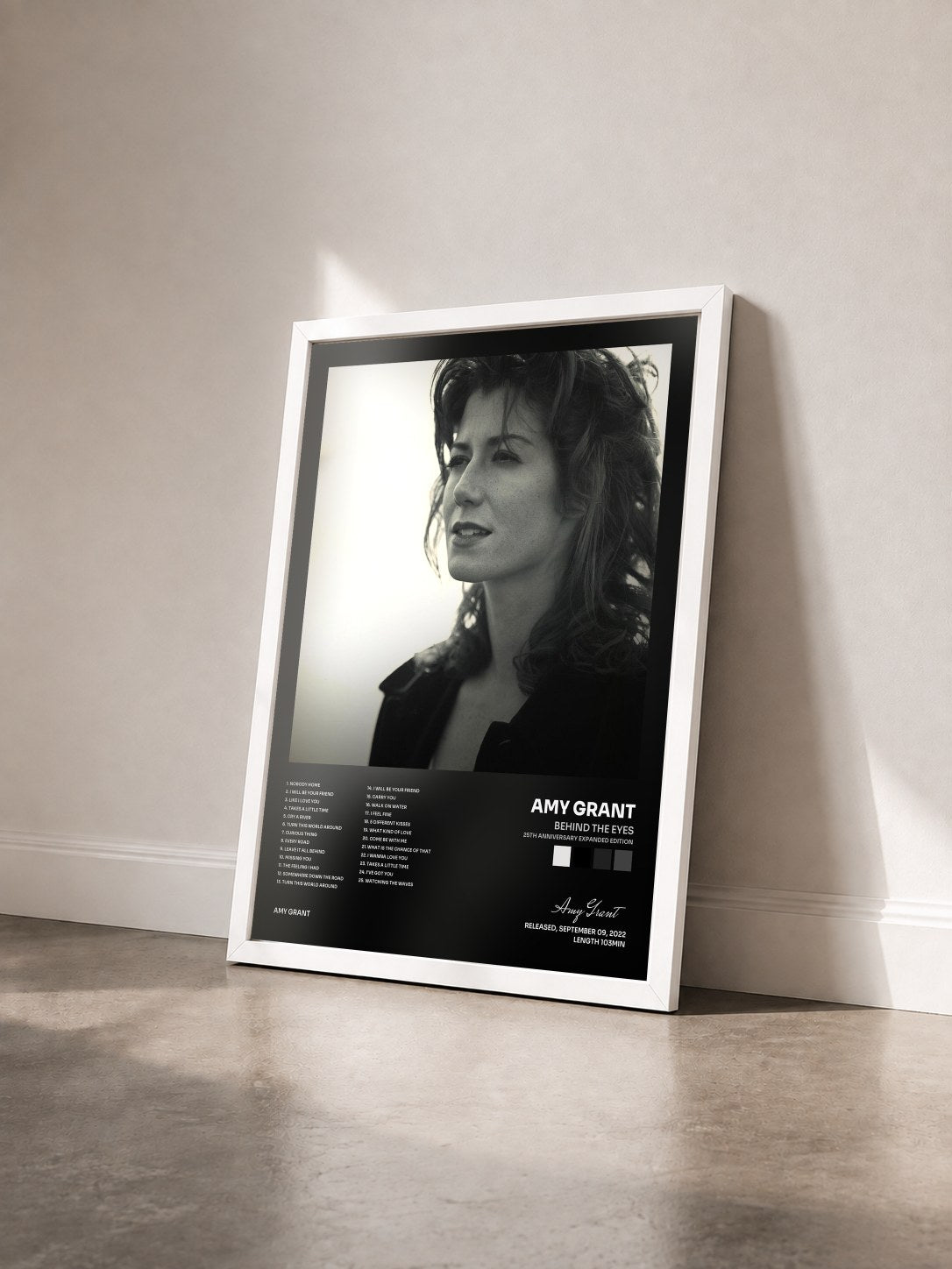 #blanc Tableau de l'album Behind The Eyes (25th Anniversary Expanded Edition) de Amy Grant vu de trois quarts, cadre blanc