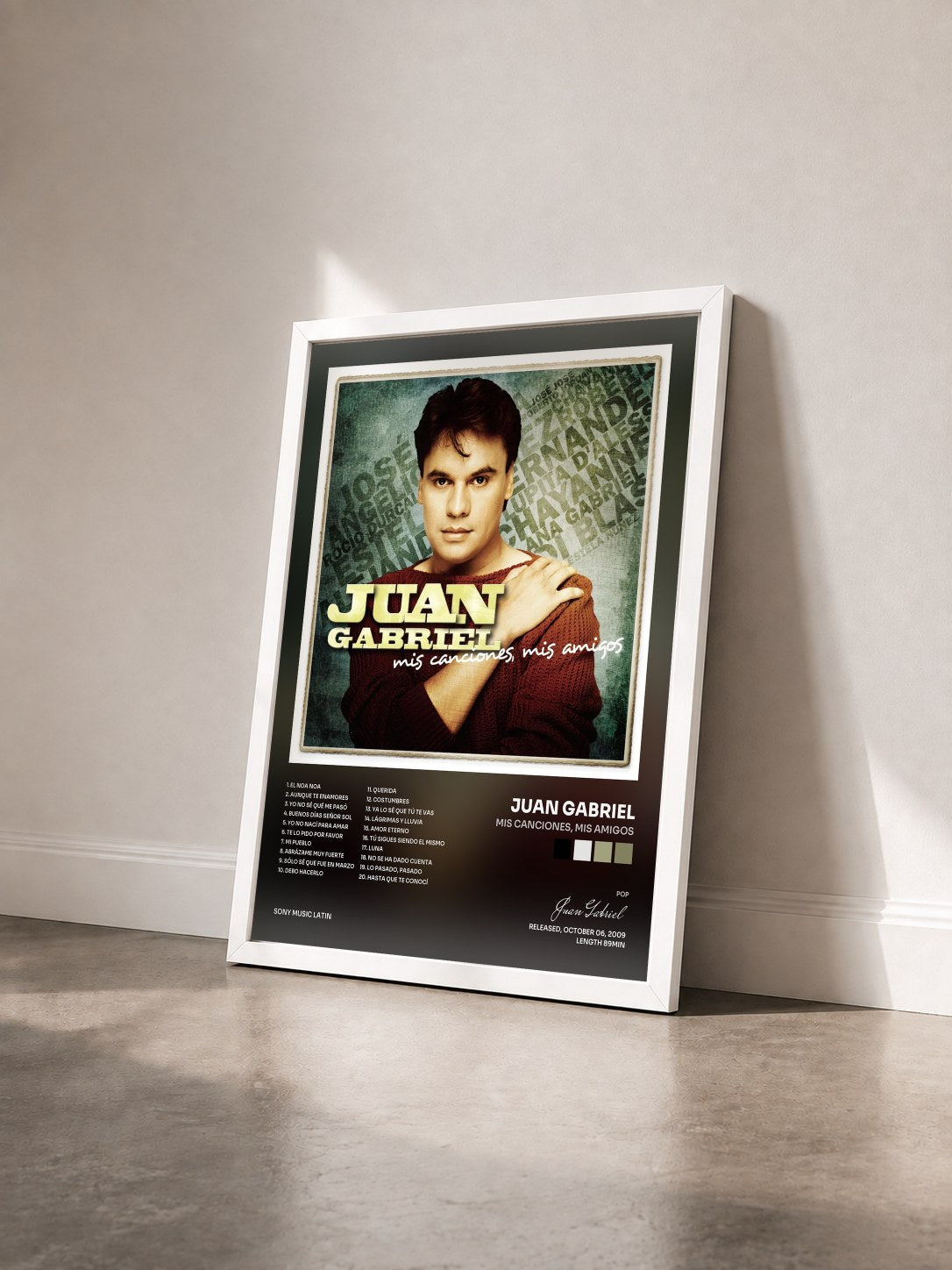 #blanc Tableau de l'album Mis Canciones, Mis Amigos de Juan Gabriel vu de trois quarts, cadre blanc