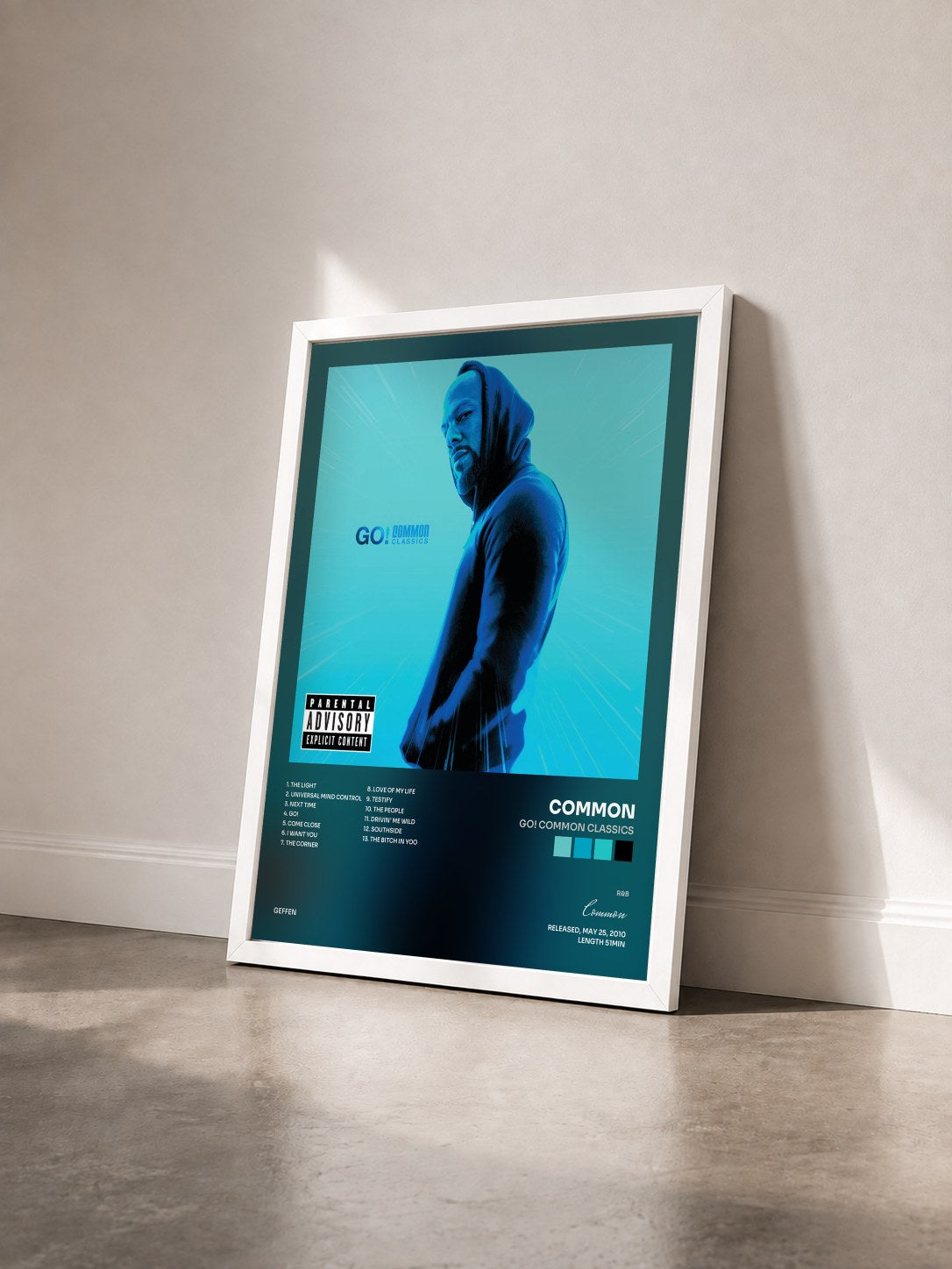 #blanc Tableau de l'album Go! Common Classics de Common vu de trois quarts, cadre blanc