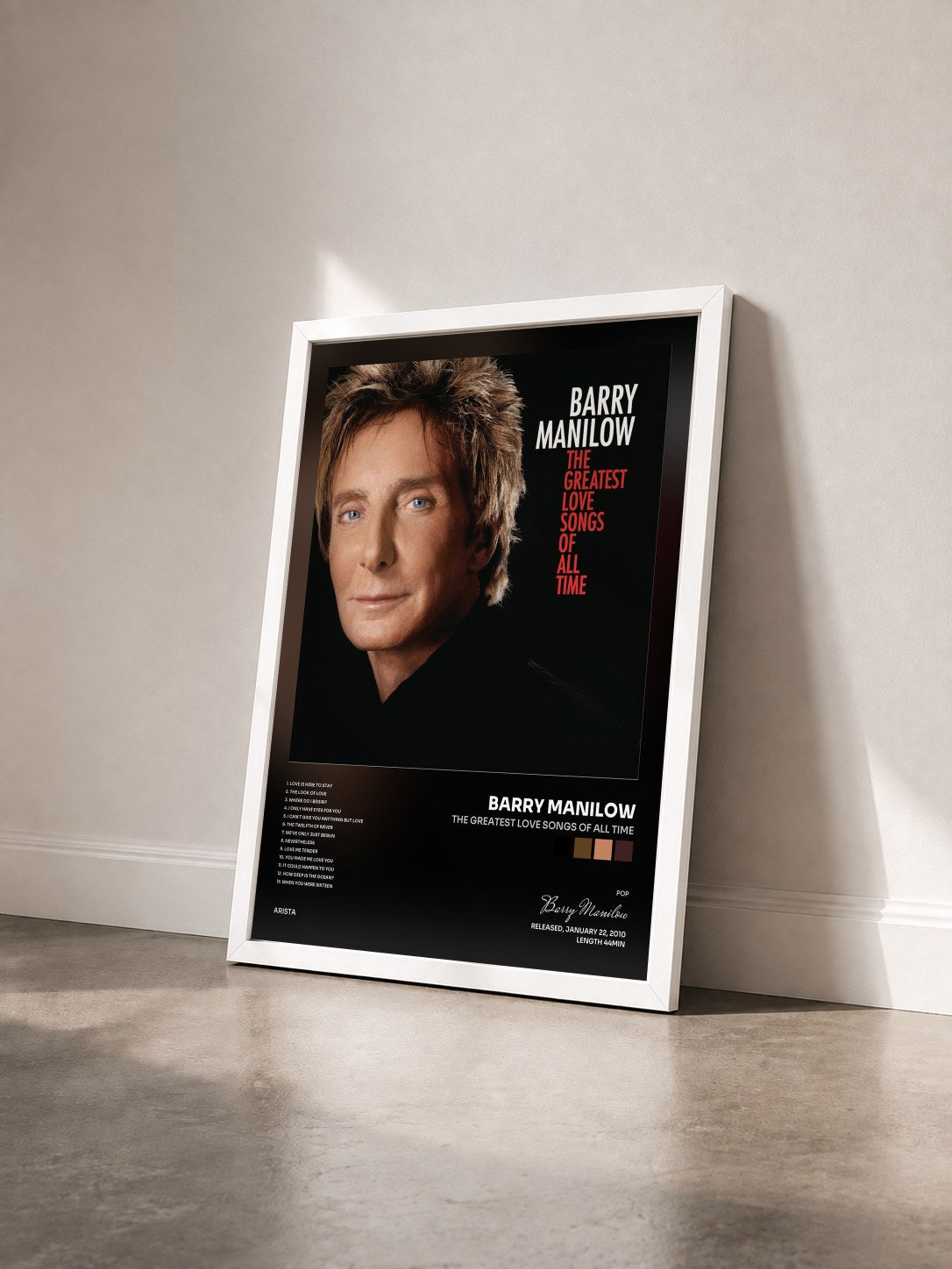 #blanc Tableau de l'album The Greatest Love Songs Of All Time de Barry Manilow vu de trois quarts, cadre blanc