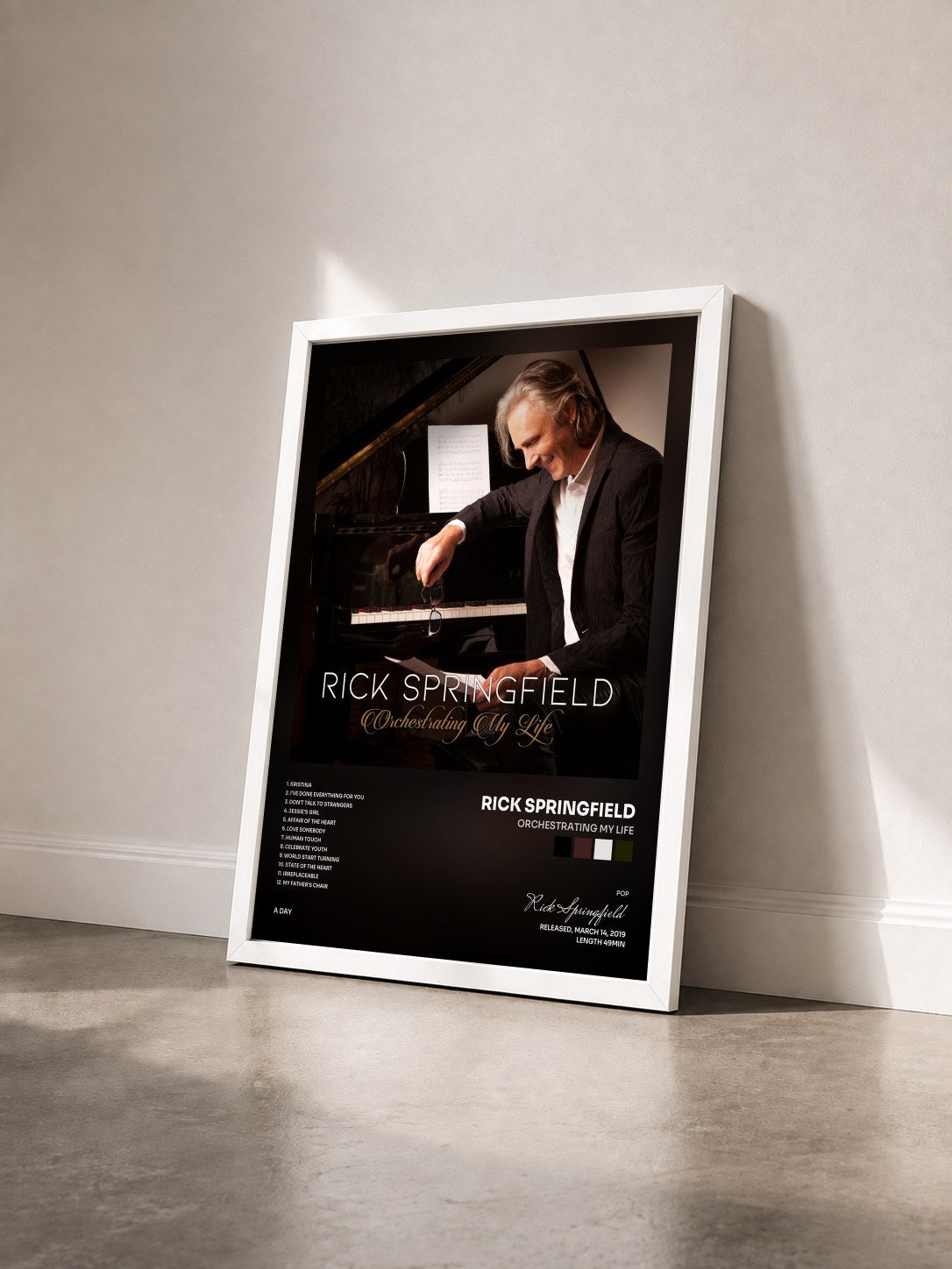 #blanc Tableau de l'album Orchestrating My Life de Rick Springfield vu de trois quarts, cadre blanc