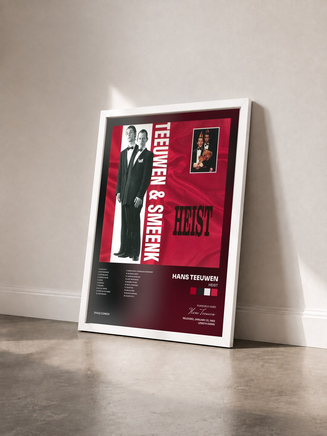 #blanc Tableau de l'album Heist de Hans Teeuwen vu de trois quarts, cadre blanc
