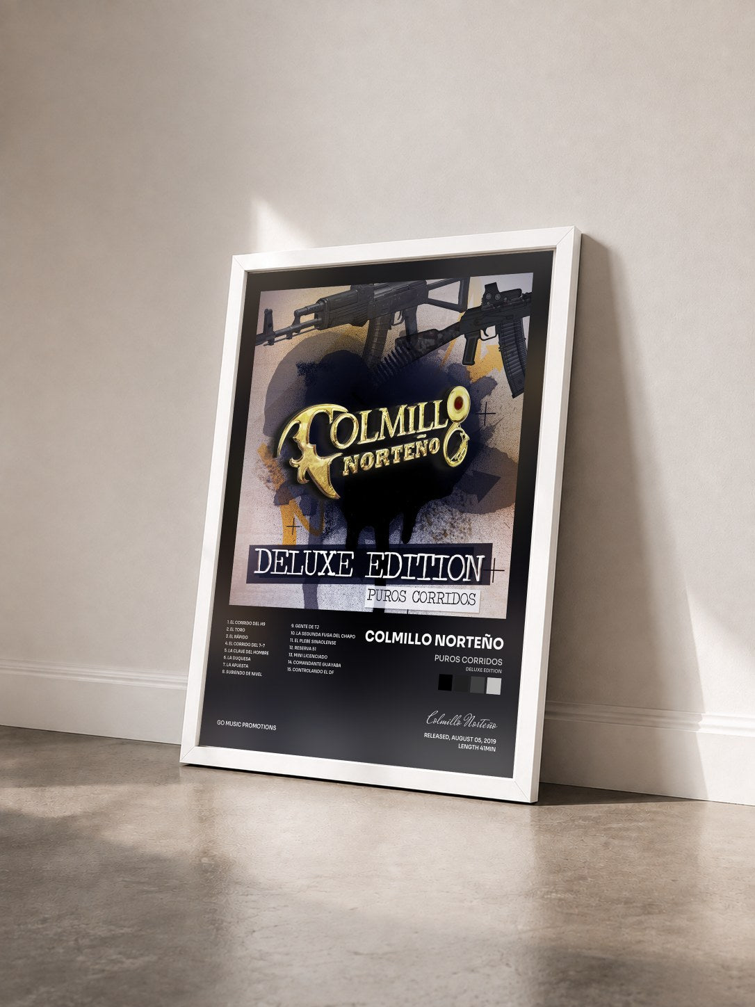 #blanc Tableau de l'album Puros Corridos (Deluxe Edition) de Colmillo Norteño vu de trois quarts, cadre blanc