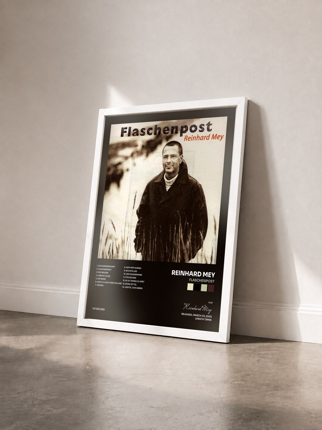 #blanc Tableau de l'album Flaschenpost de Reinhard Mey vu de trois quarts, cadre blanc