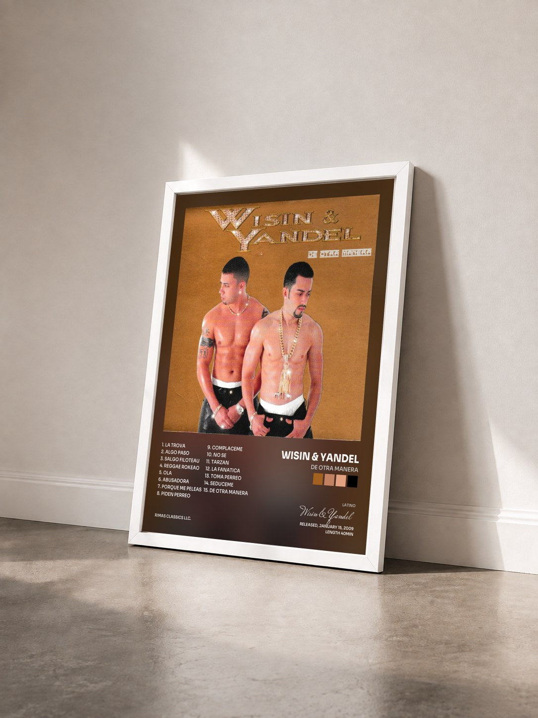 #blanc Tableau de l'album De Otra Manera de Wisin & Yandel vu de trois quarts, cadre blanc