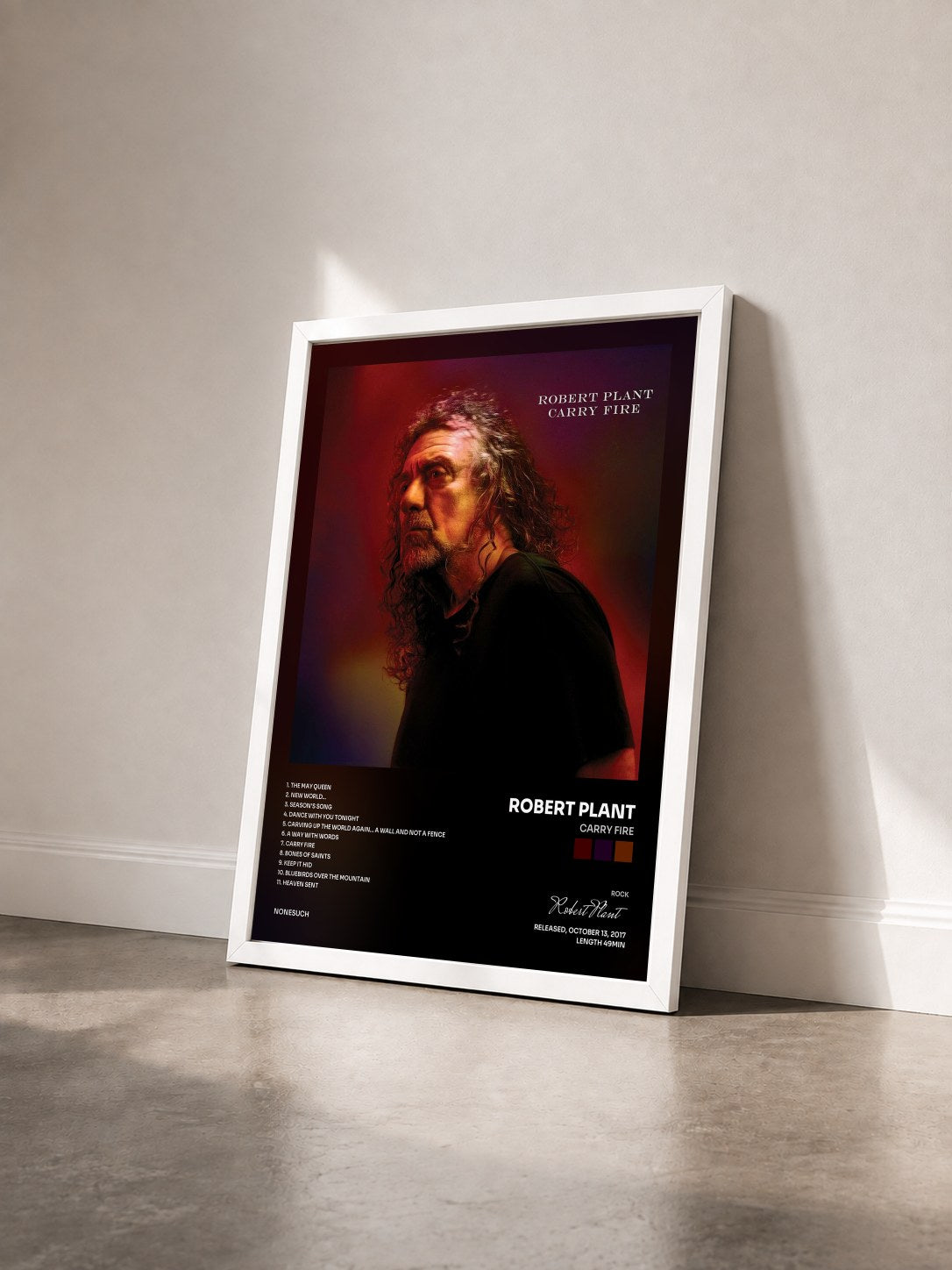 #blanc Tableau de l'album Carry Fire de Robert Plant vu de trois quarts, cadre blanc