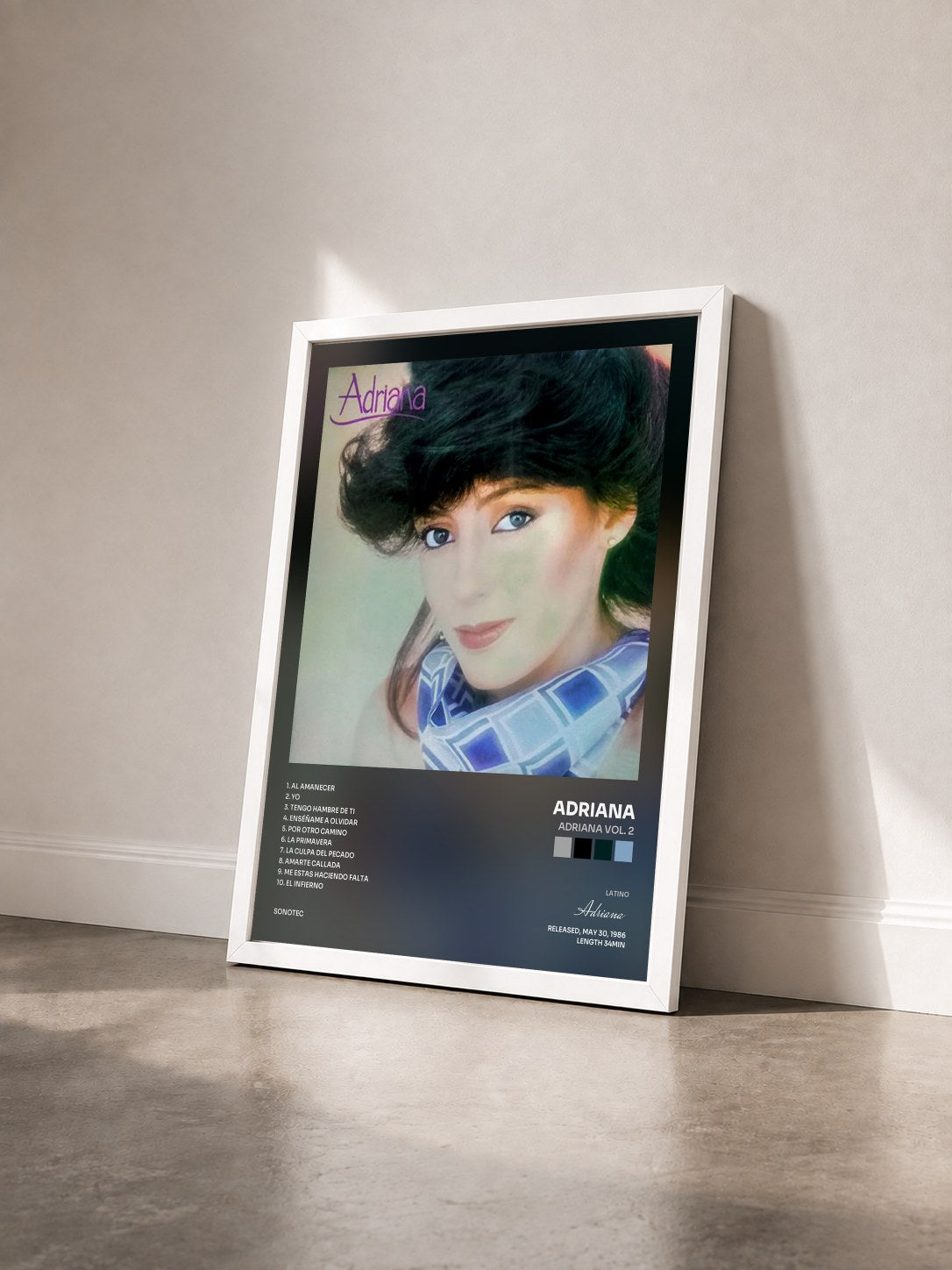 #blanc Tableau de l'album Adriana Vol. 2 de Adriana vu de trois quarts, cadre blanc