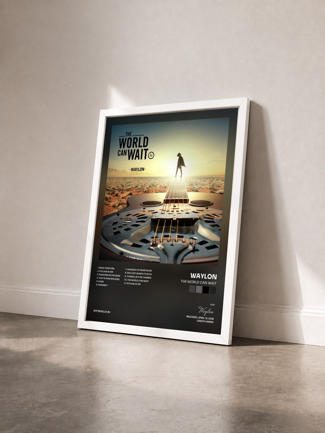 #blanc Tableau de l'album The World Can Wait de Waylon vu de trois quarts, cadre blanc