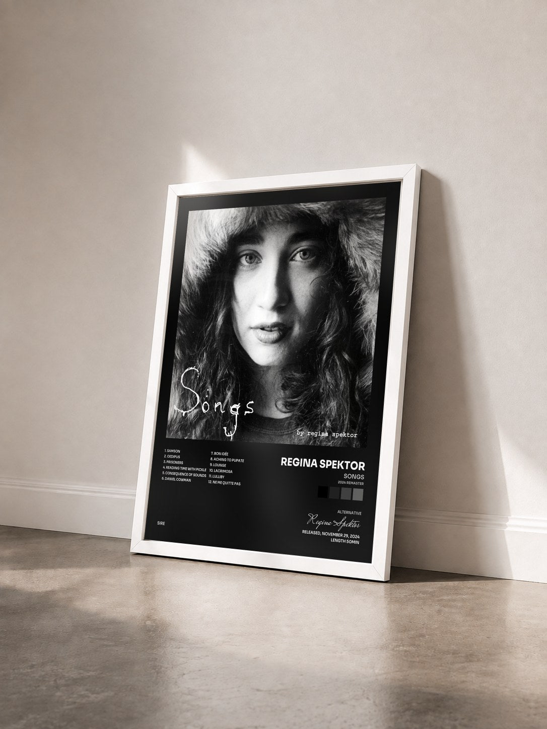 #blanc Tableau de l'album Songs (2024 Remaster) de Regina Spektor vu de trois quarts, cadre blanc