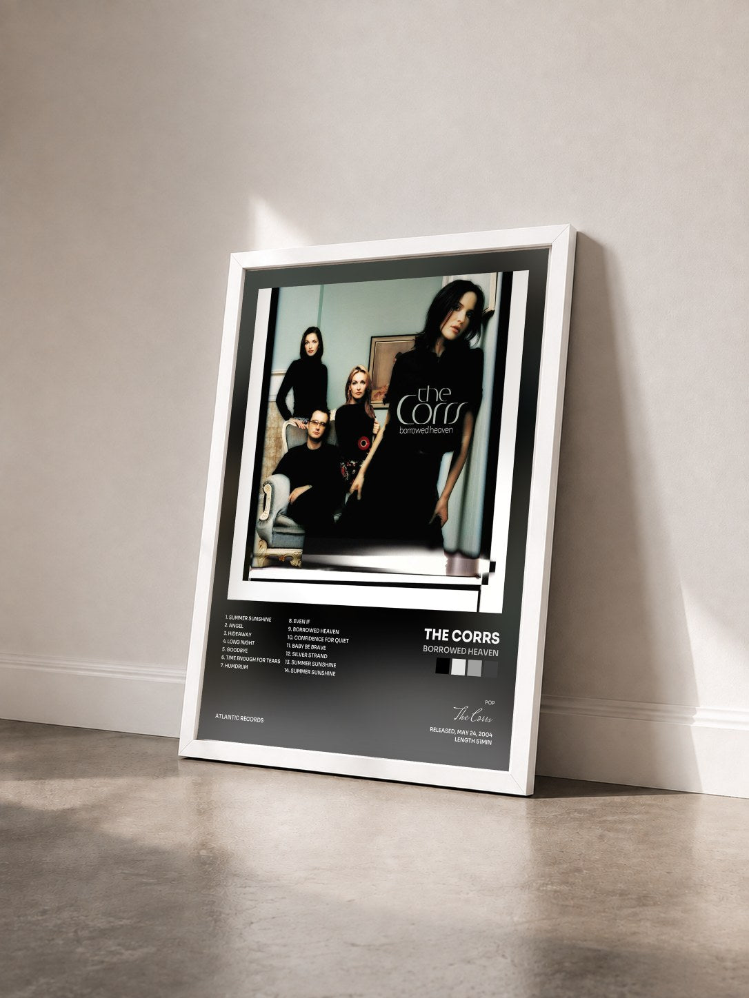 #blanc Tableau de l'album Borrowed Heaven de The Corrs vu de trois quarts, cadre blanc