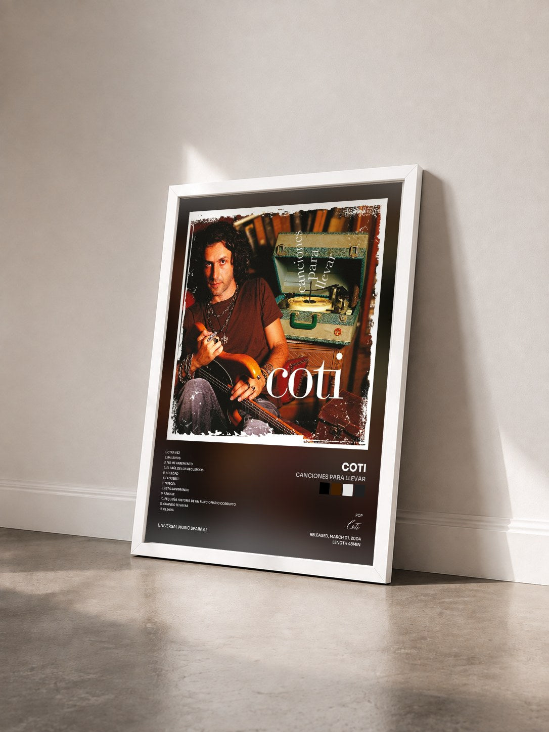 #blanc Tableau de l'album Canciones Para Llevar de Coti vu de trois quarts, cadre blanc