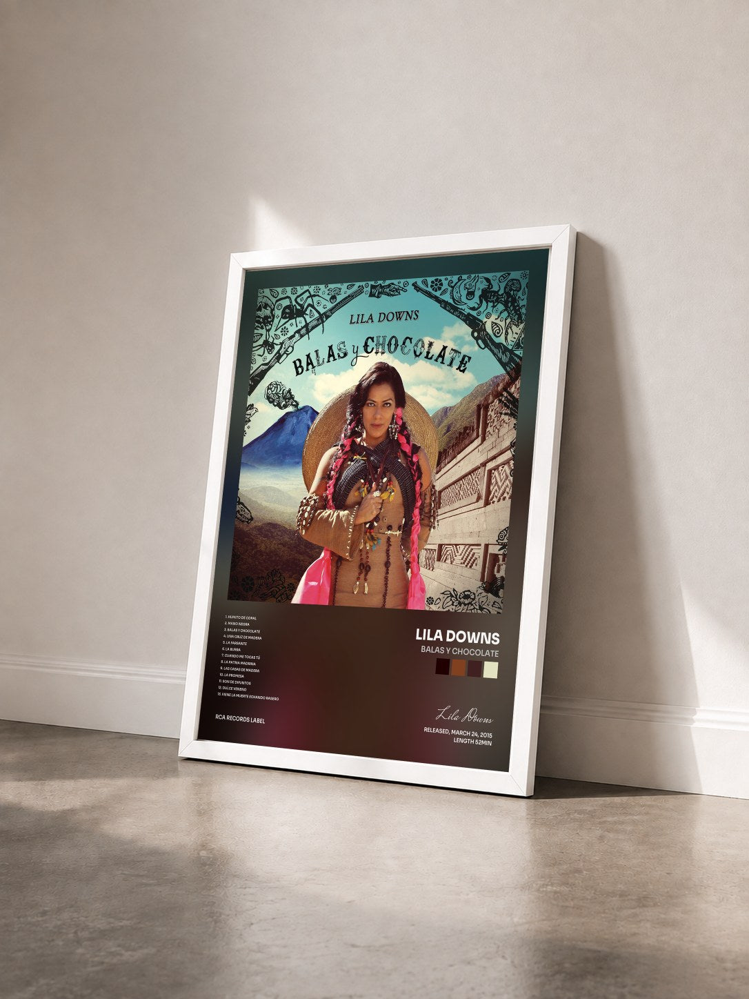 #blanc Tableau de l'album Balas y Chocolate de Lila Downs vu de trois quarts, cadre blanc