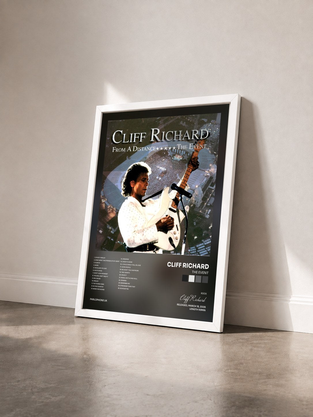#blanc Tableau de l'album The Event de Cliff Richard vu de trois quarts, cadre blanc