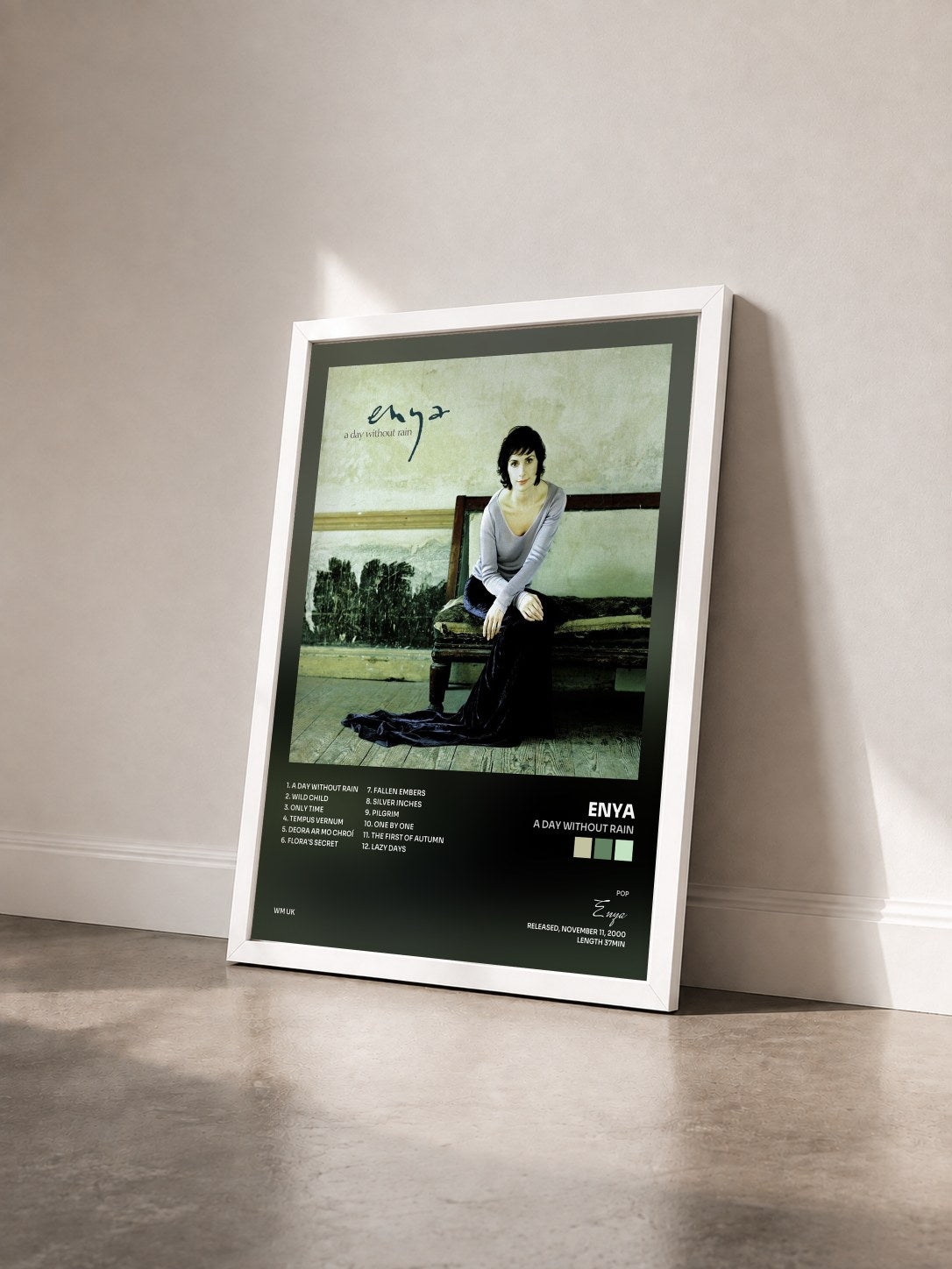 #blanc Tableau de l'album A Day Without Rain de Enya vu de trois quarts, cadre blanc